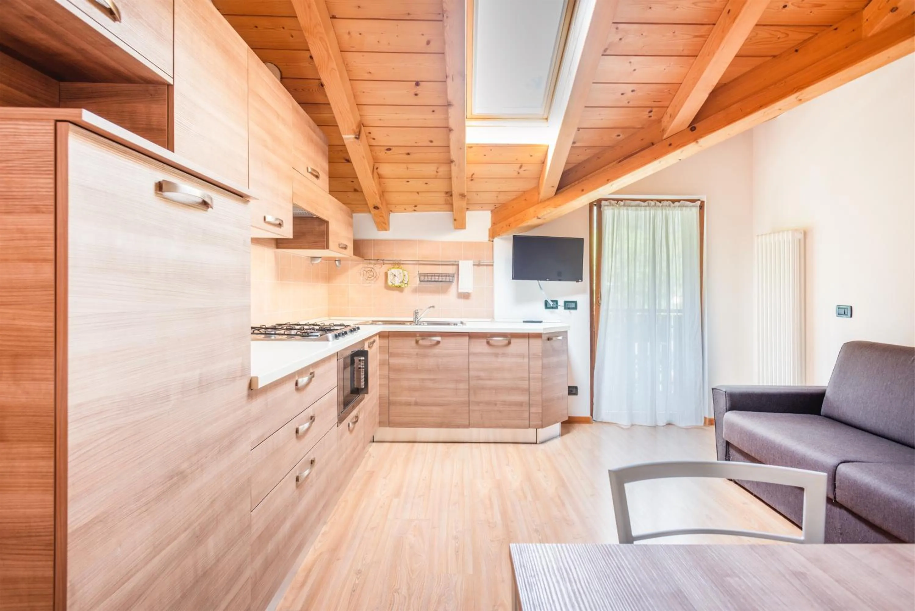 Kitchen or kitchenette in CROSINA HOLIDAY - Residence Toli