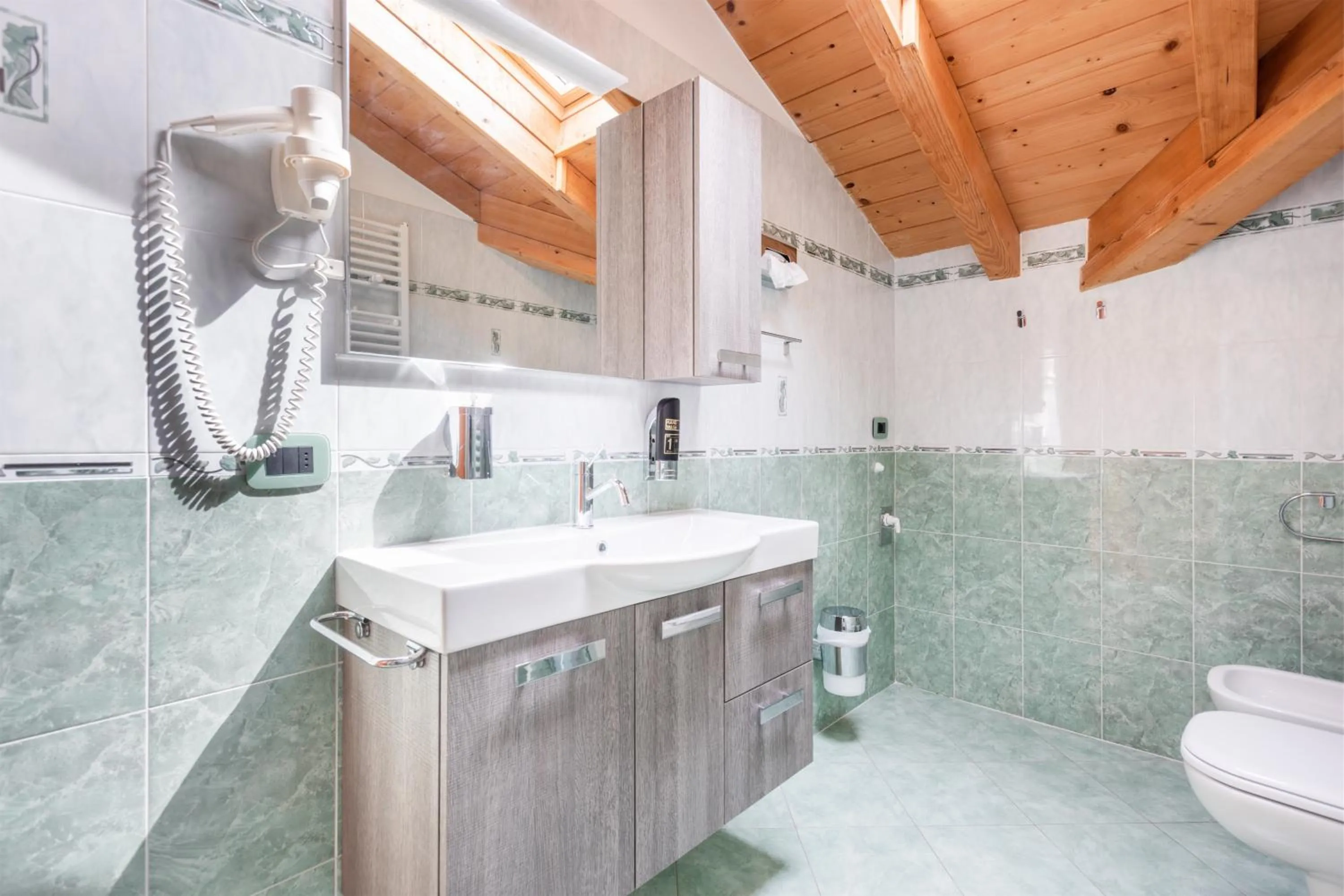 Bathroom in CROSINA HOLIDAY - Residence Toli