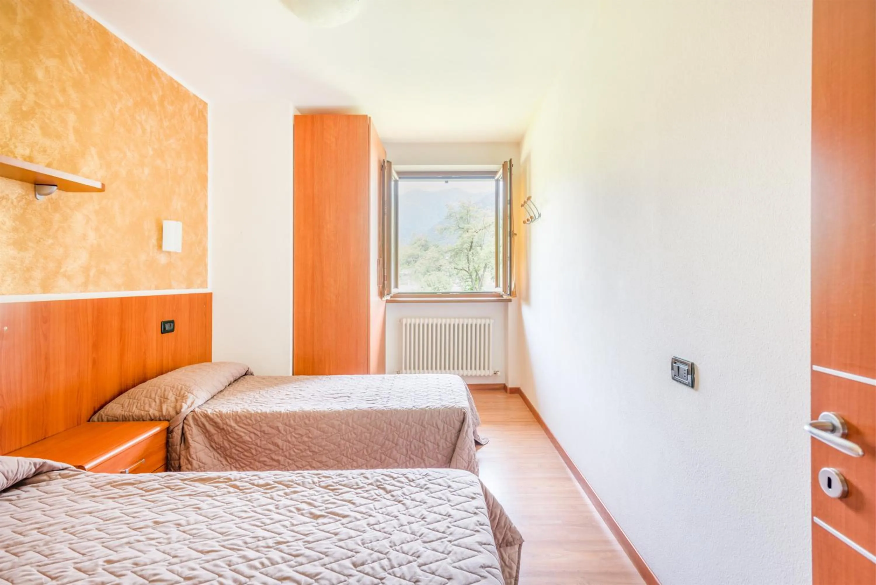 Photo of the whole room, Bed in CROSINA HOLIDAY - Residence Toli