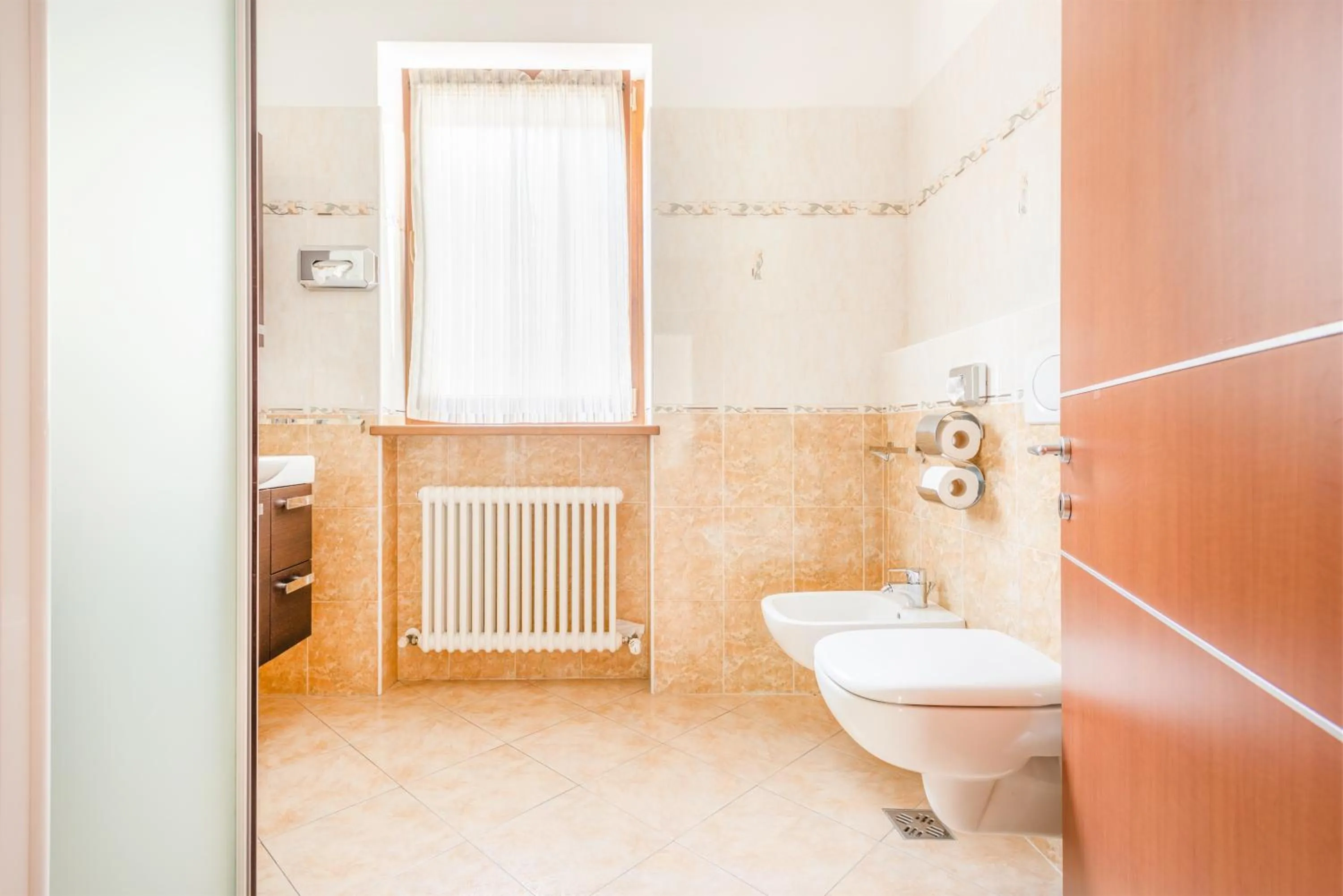 Bathroom in CROSINA HOLIDAY - Residence Toli