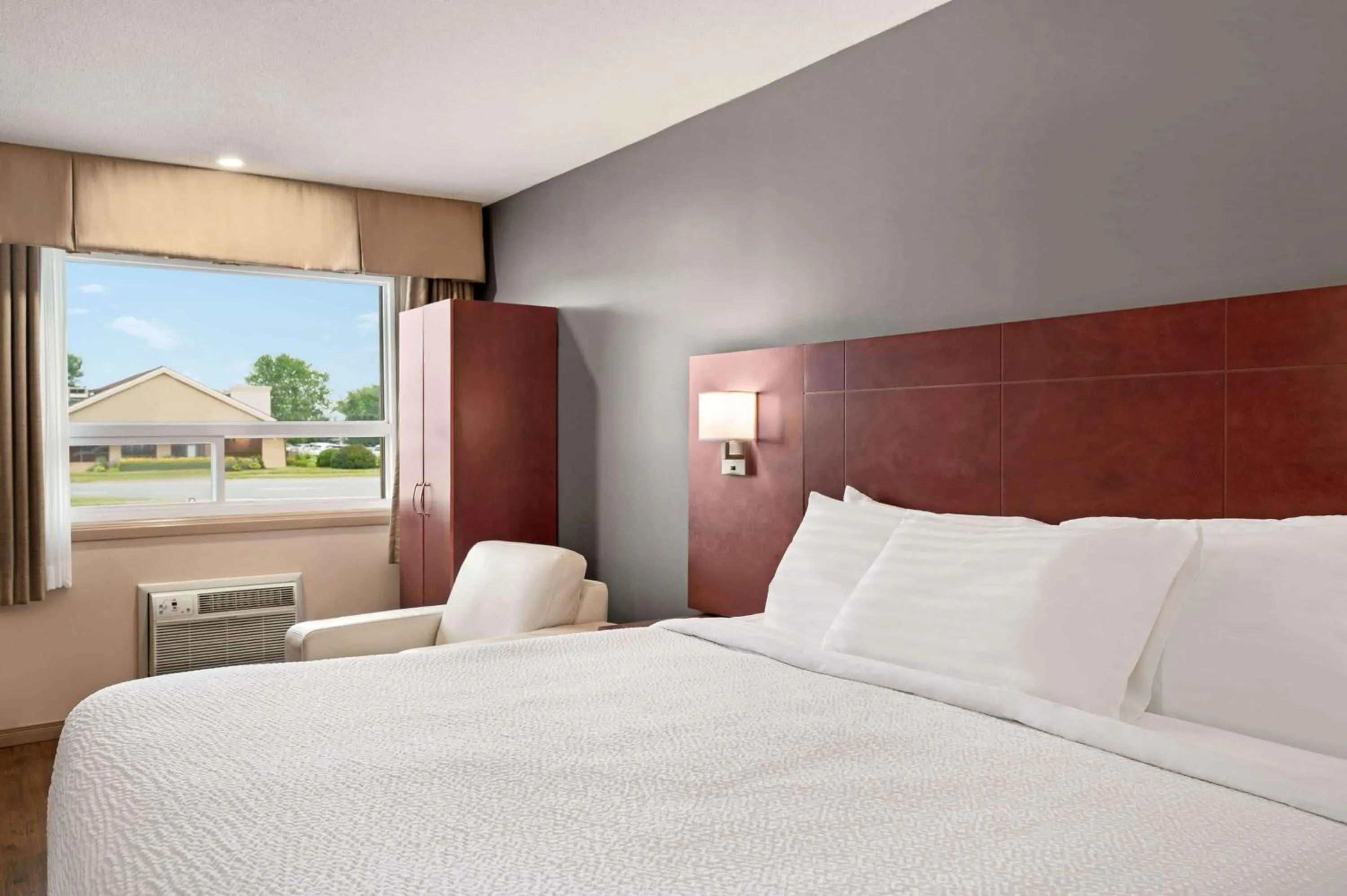 Photo of the whole room, Bed in Days Inn by Wyndham Fredericton