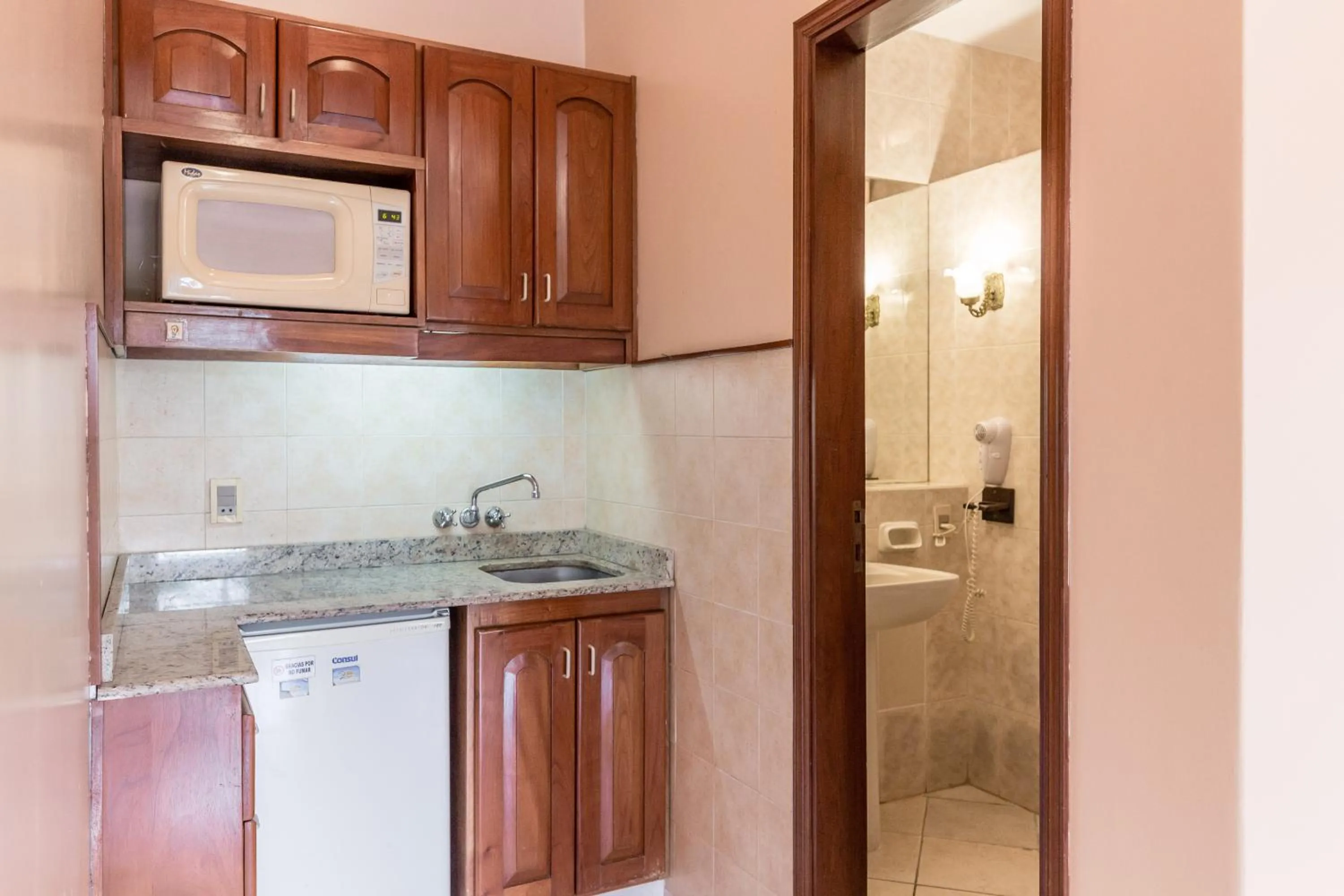 Kitchen or kitchenette in Paramanta Lifestyle Hotel