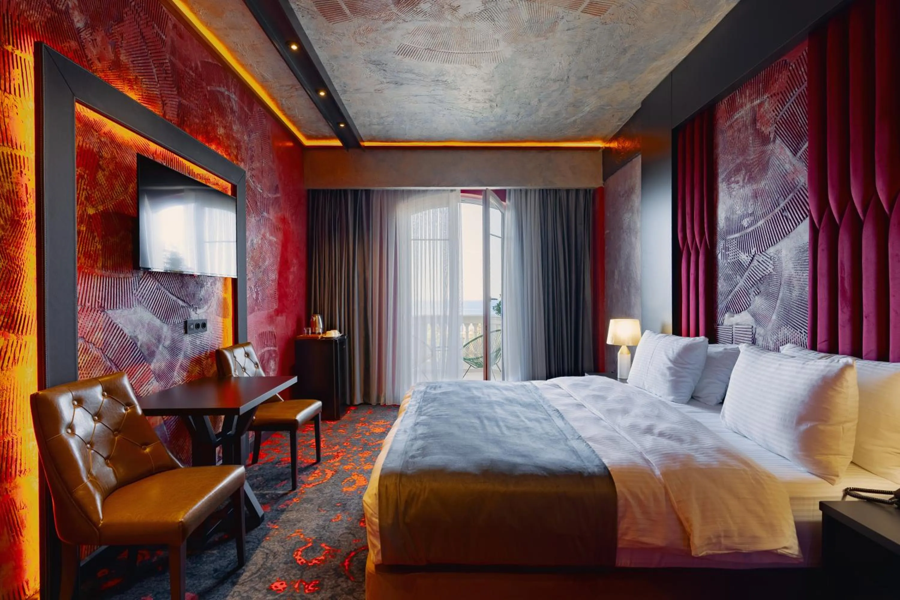 Photo of the whole room, Bed in Tapis Rouge Design Boutique Hotel