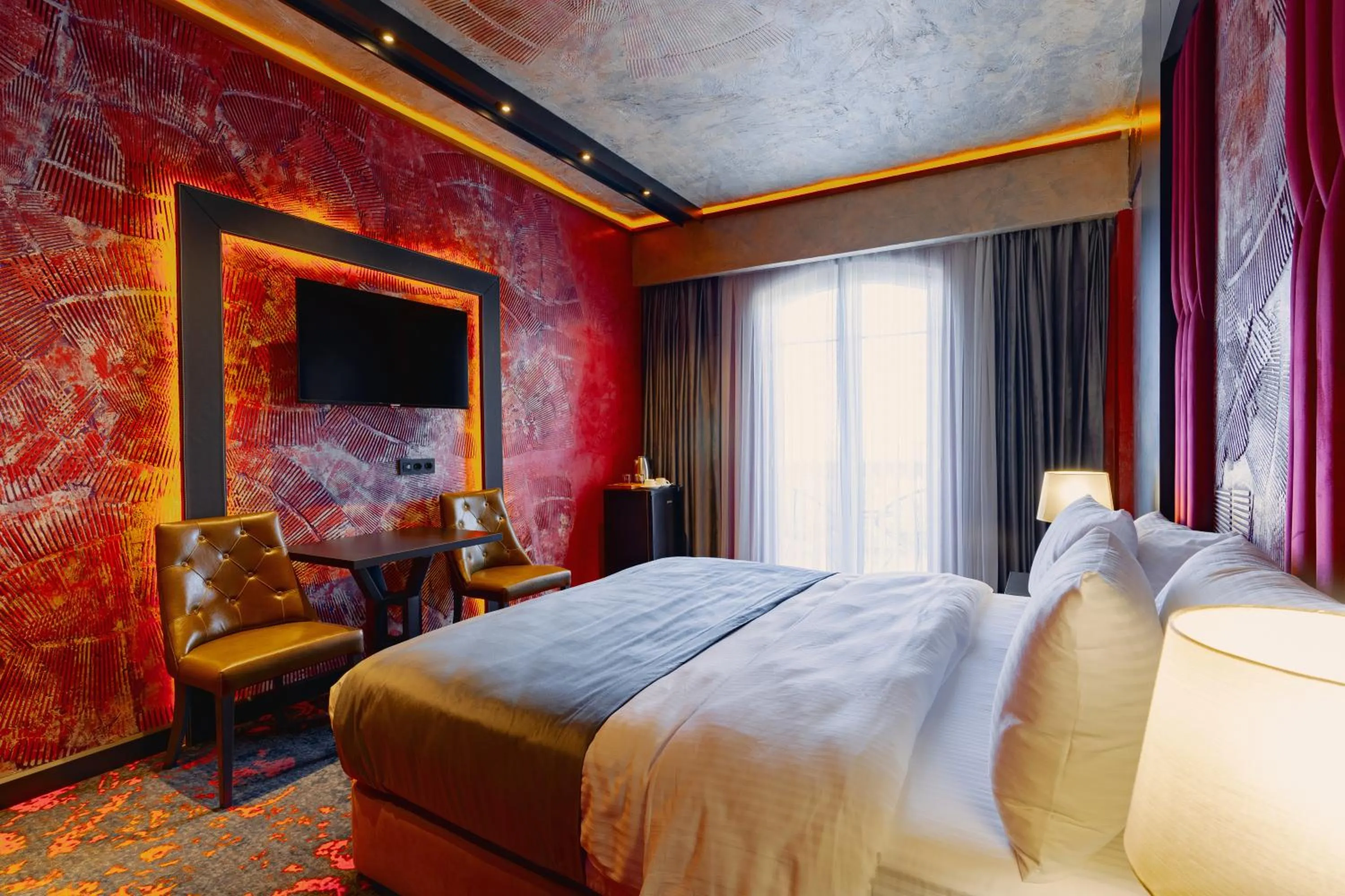 TV and multimedia, Bed in Tapis Rouge Design Boutique Hotel