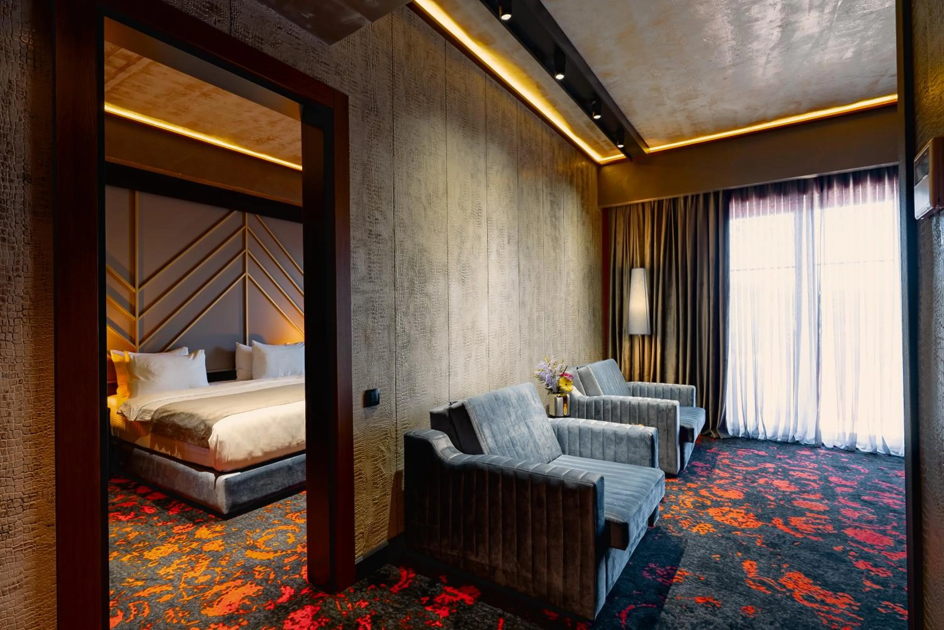 Living room, Bed in Tapis Rouge Design Boutique Hotel