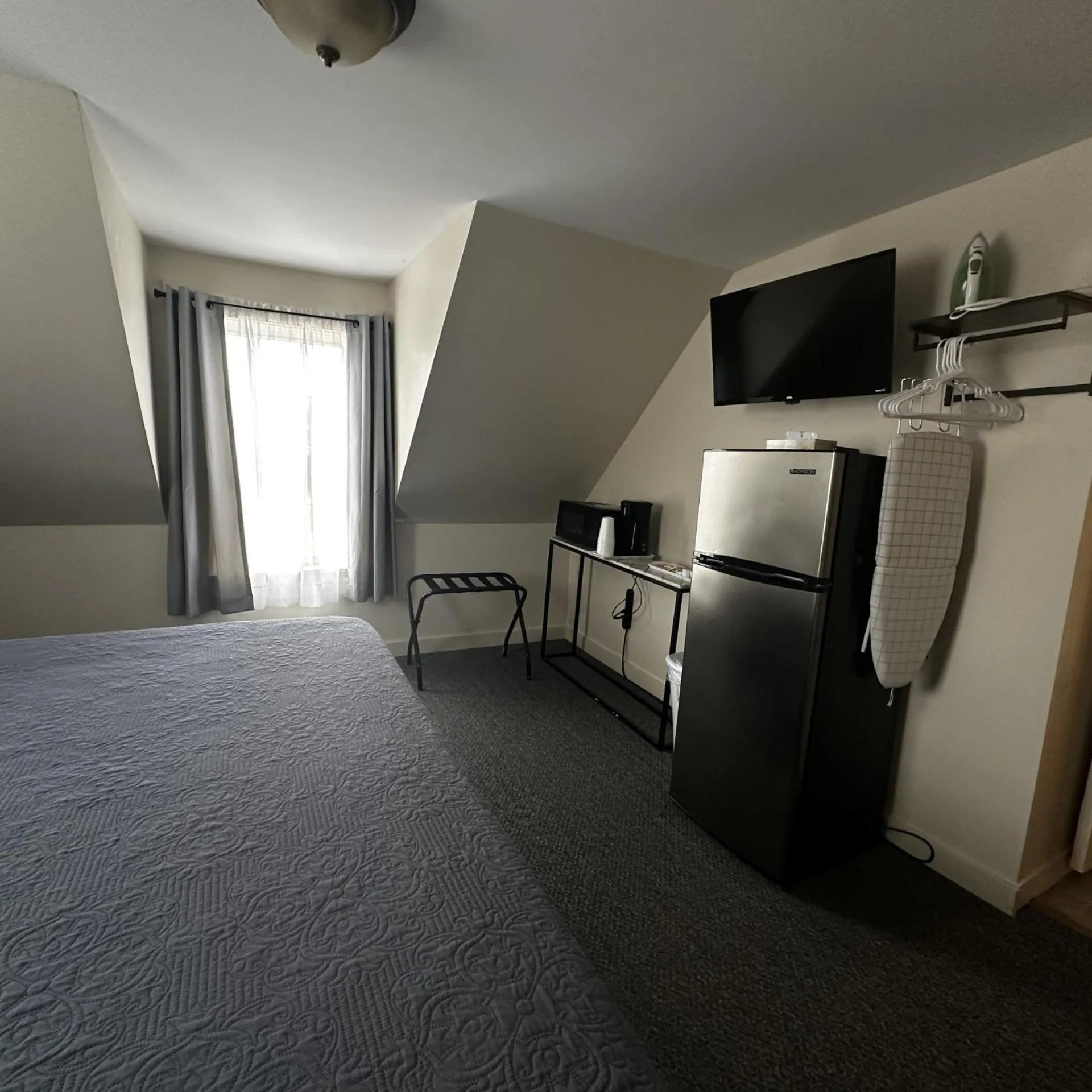 Bed in The Whitetail Inn and Suites- Lincoln