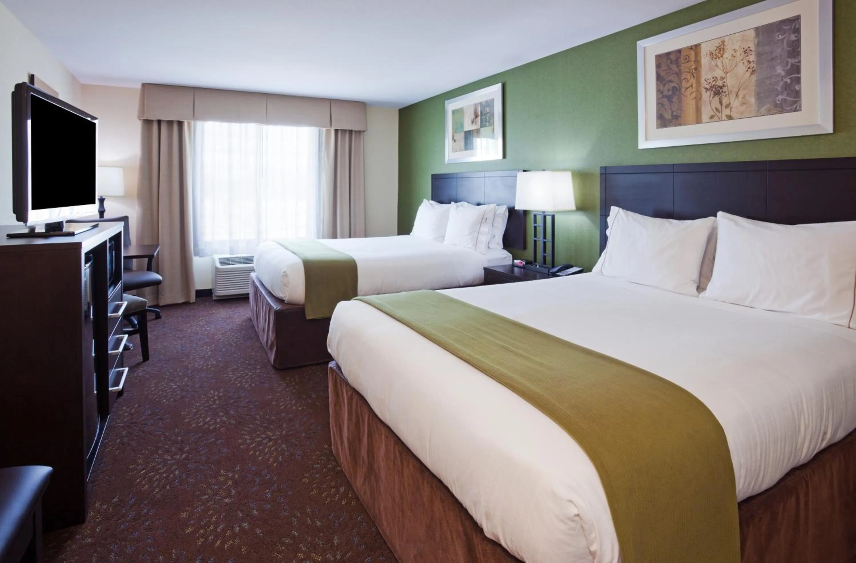 Bedroom, Bed in Holiday Inn Express and Suites Rochester West-Medical Center by IHG