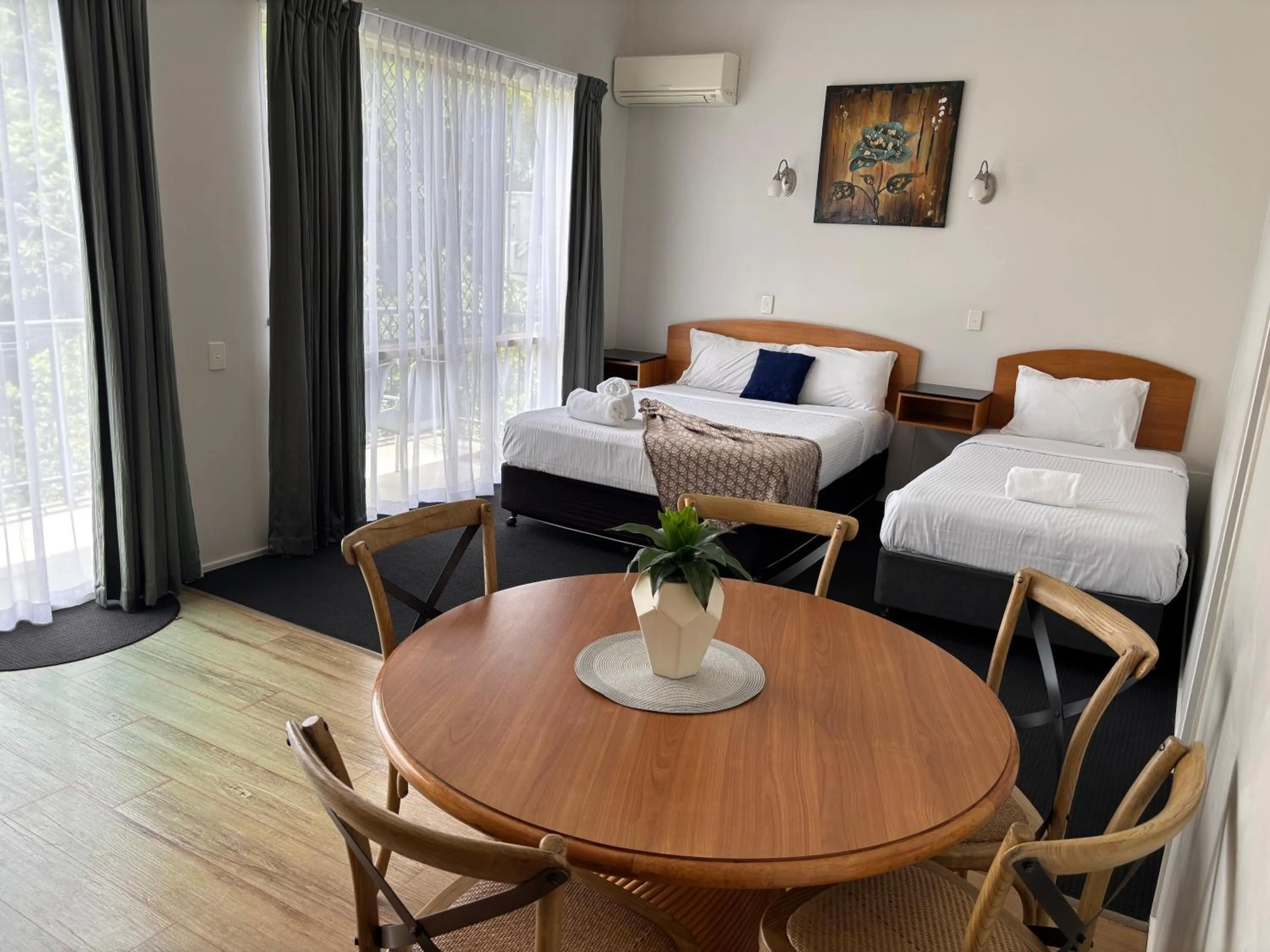 Seating area, Bed in Caboolture Riverlakes Boutique Motel