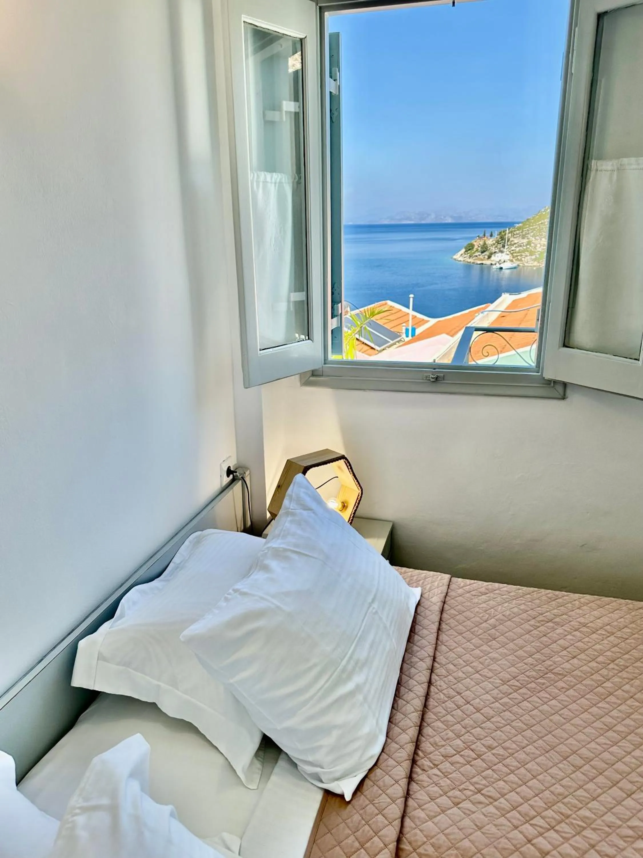 View (from property/room), Bed in Niriides Hotel Apartments