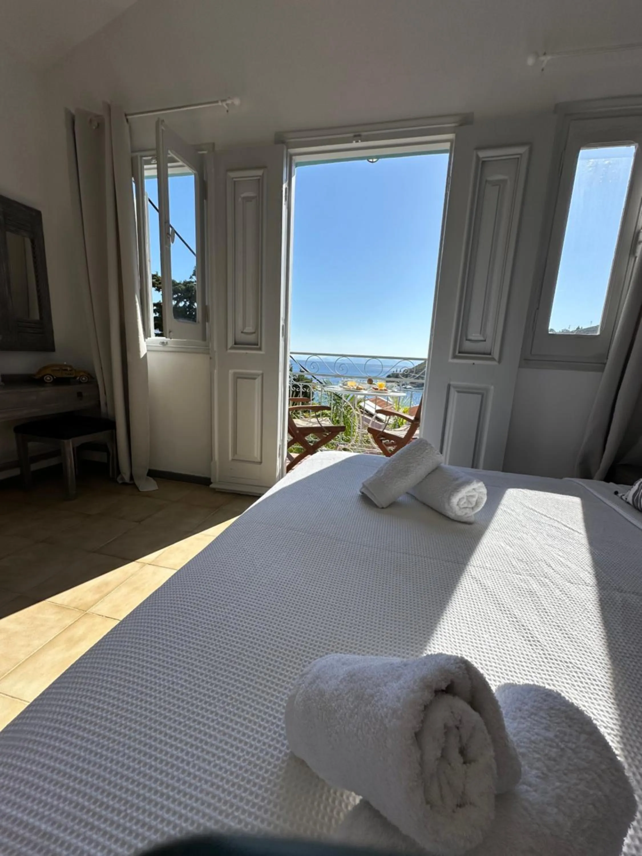 View (from property/room), Bed in Niriides Hotel Apartments