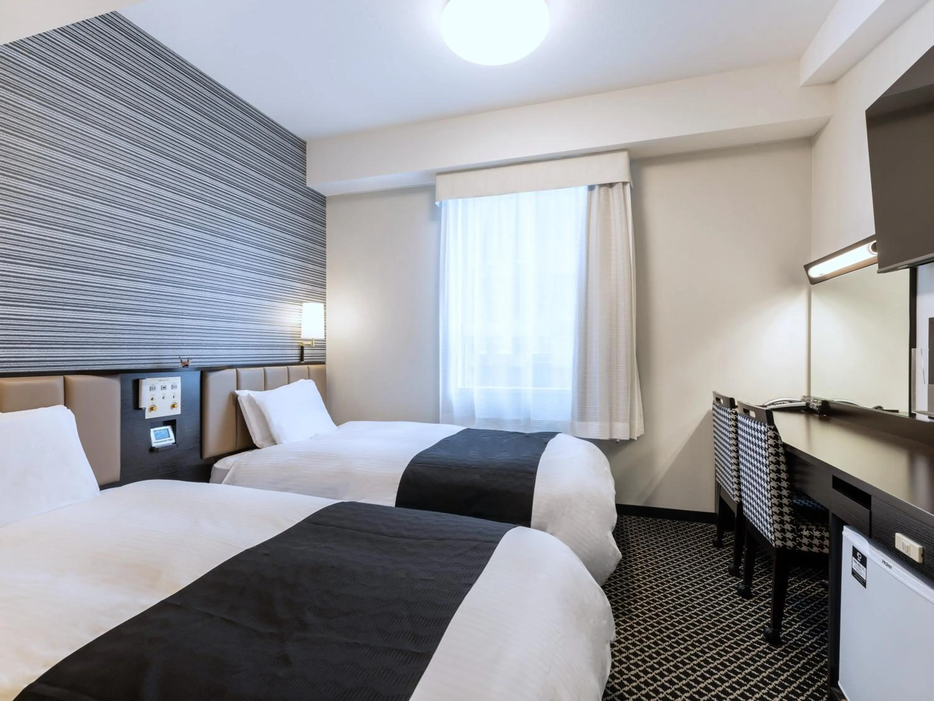 Photo of the whole room, Bed in APA Hotel Sapporo Susukino Ekimae