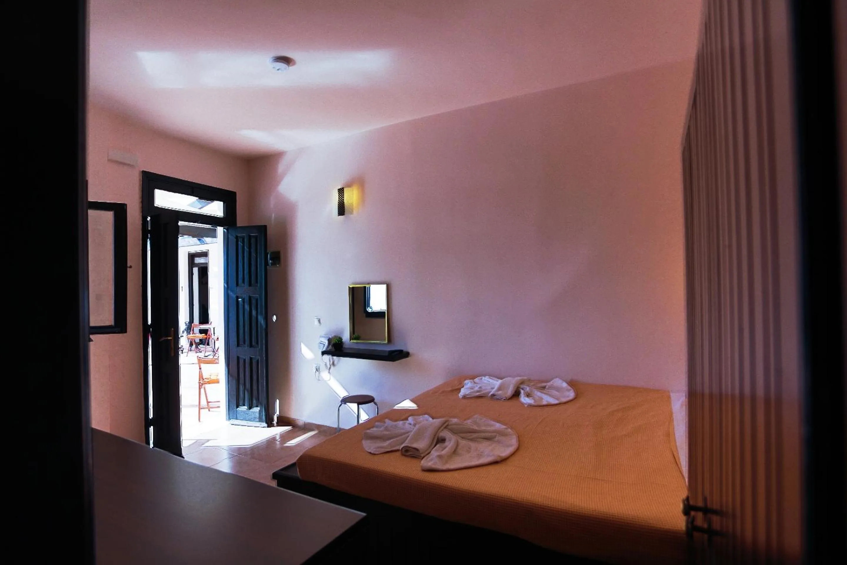 Bed in Little Lindos Sea View Studios