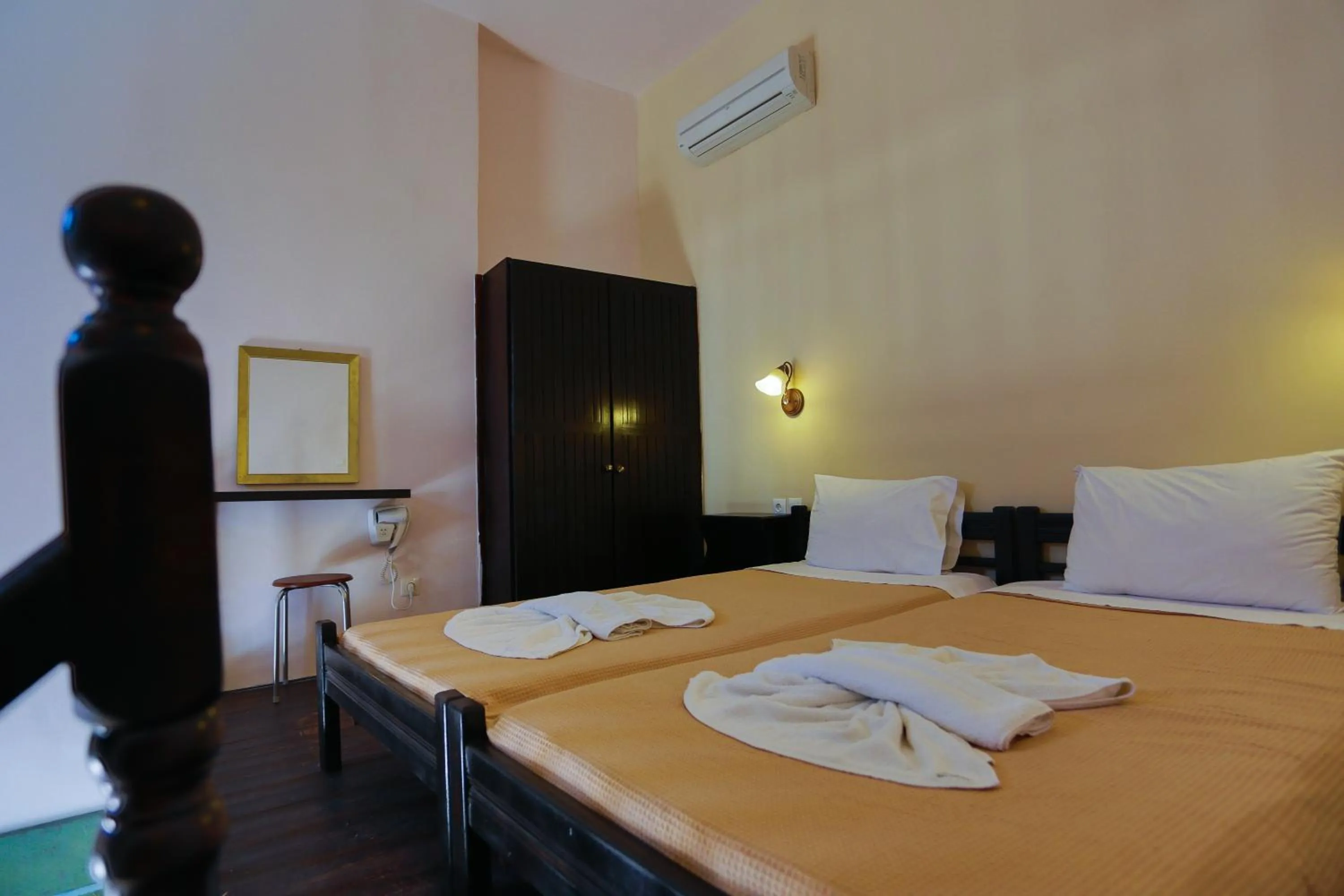 Bed in Little Lindos Sea View Studios