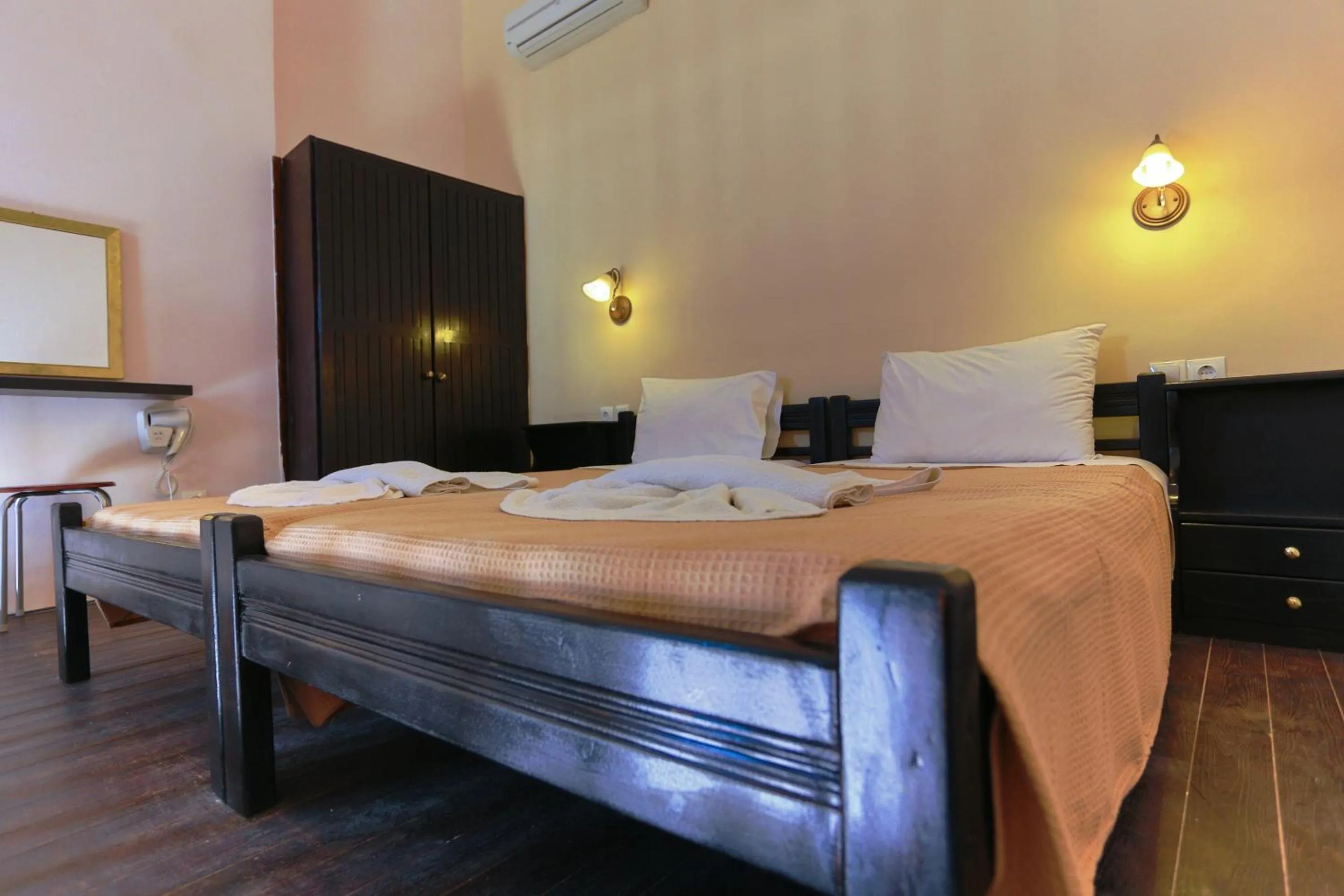 Bed in Little Lindos Sea View Studios