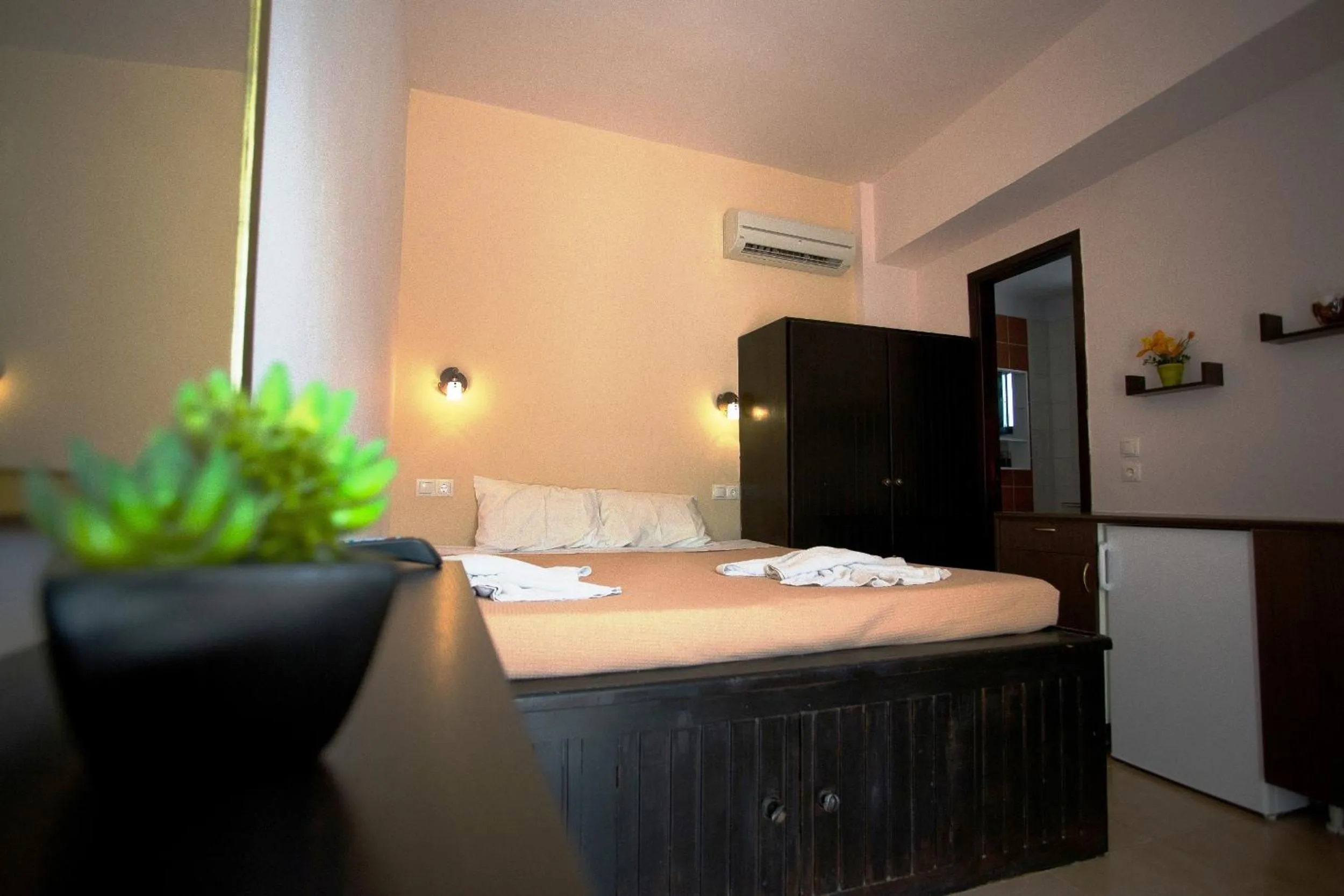 Bed in Little Lindos Sea View Studios