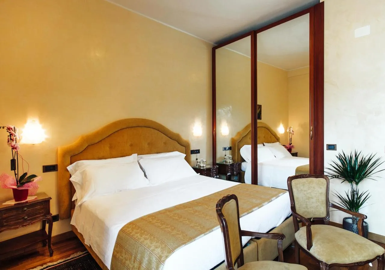 Bed in Grand Hotel Excelsior