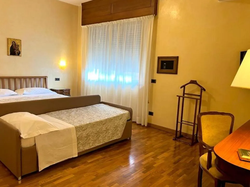 Bed in Grand Hotel Excelsior