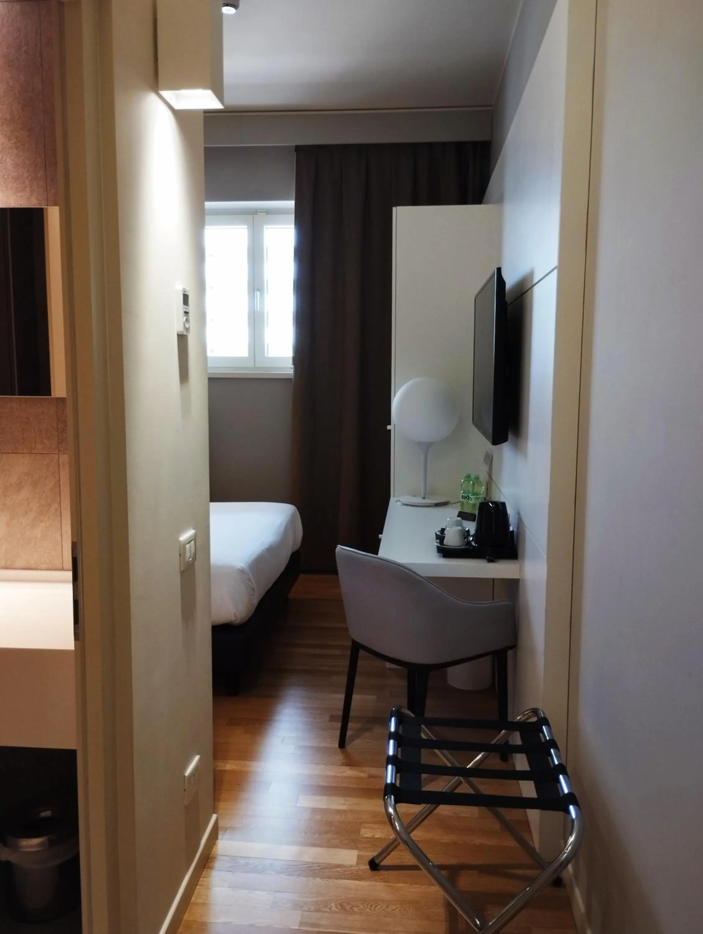 Bed in Boiardo Hotel