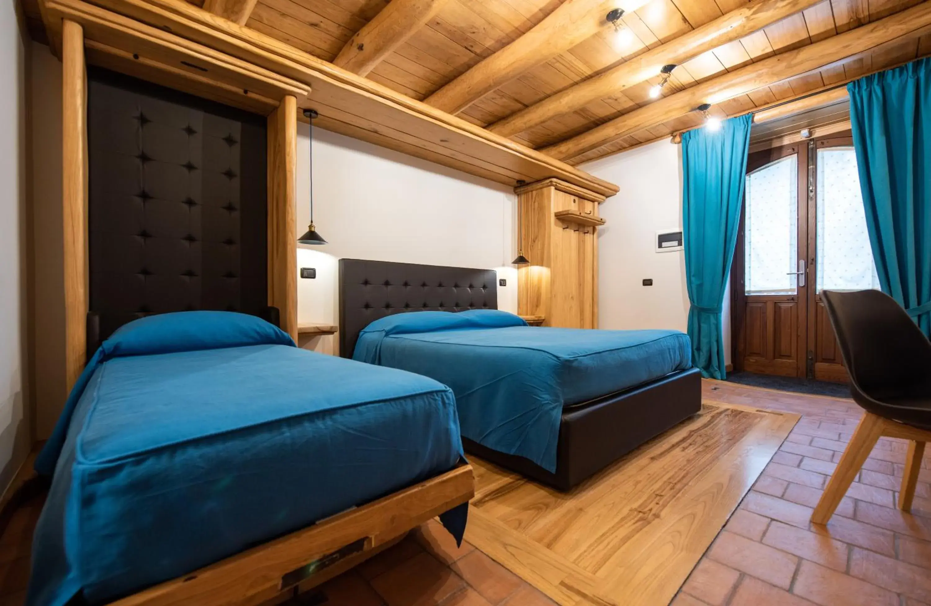 Triple Room in Etna Quota Mille Boutique Hotel, Typical Sicilian Food & Wine Triple Room in Etna Quota Mille Boutique Hotel, Typical Sicilian Food & Wine