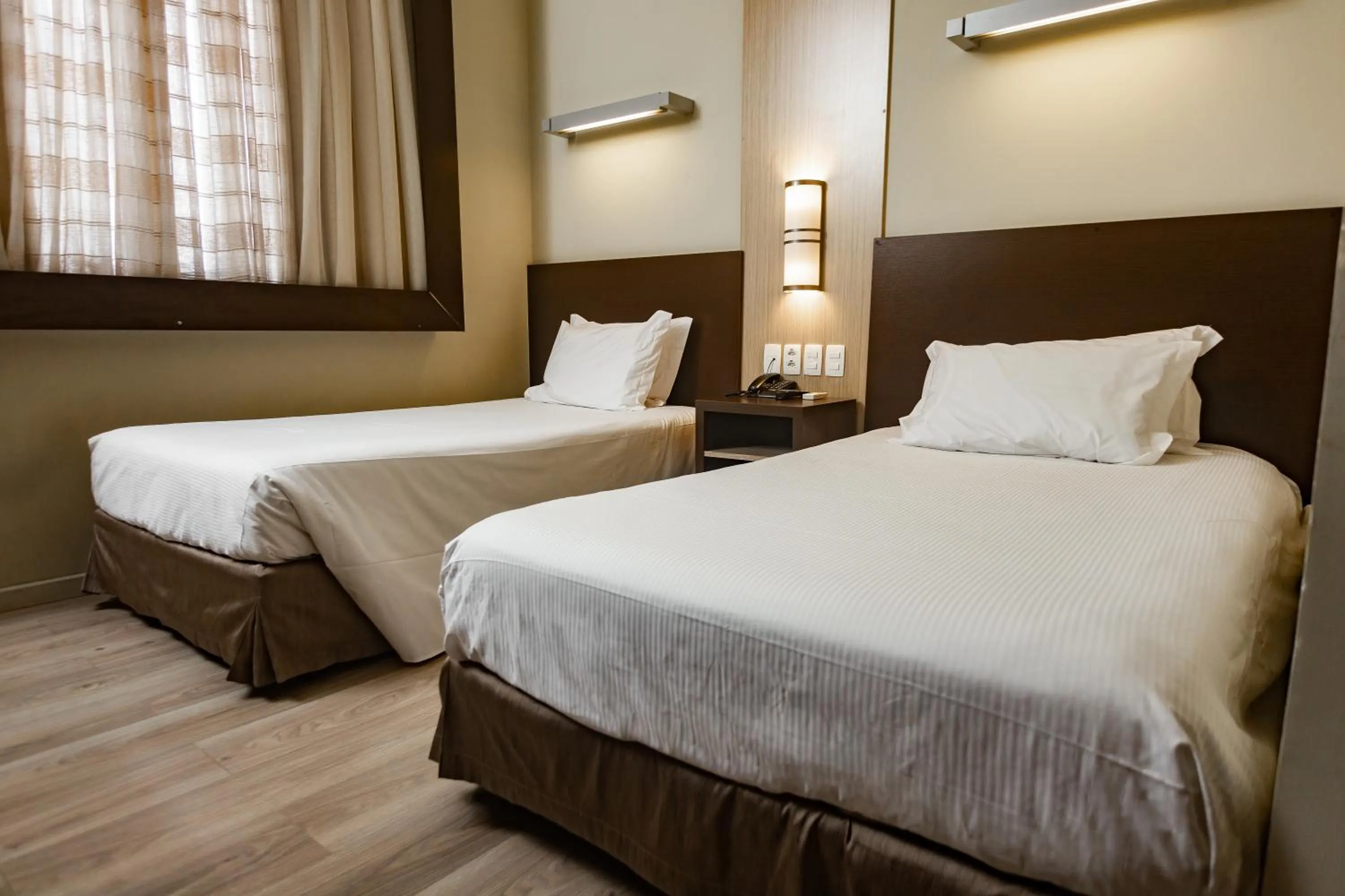 Bed in Master Cosmopolitan Moinhos de Vento