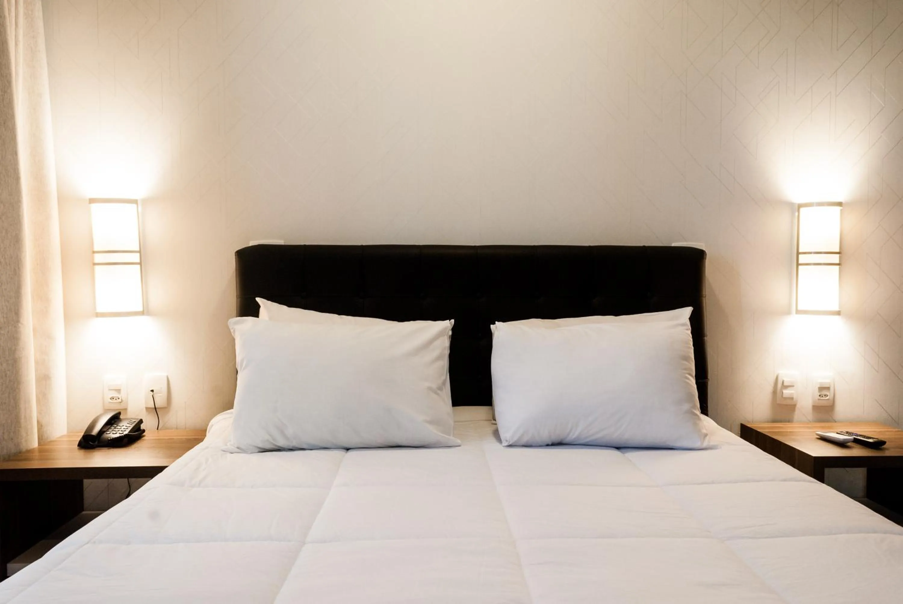 Bed in Master Cosmopolitan Moinhos de Vento