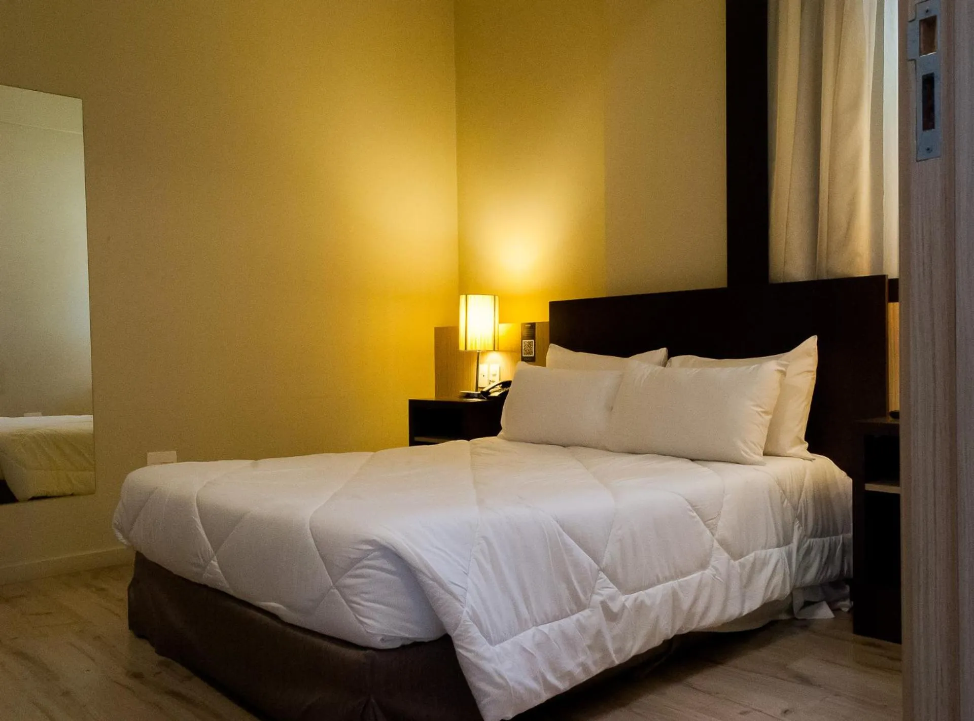 Bed in Master Cosmopolitan Moinhos de Vento