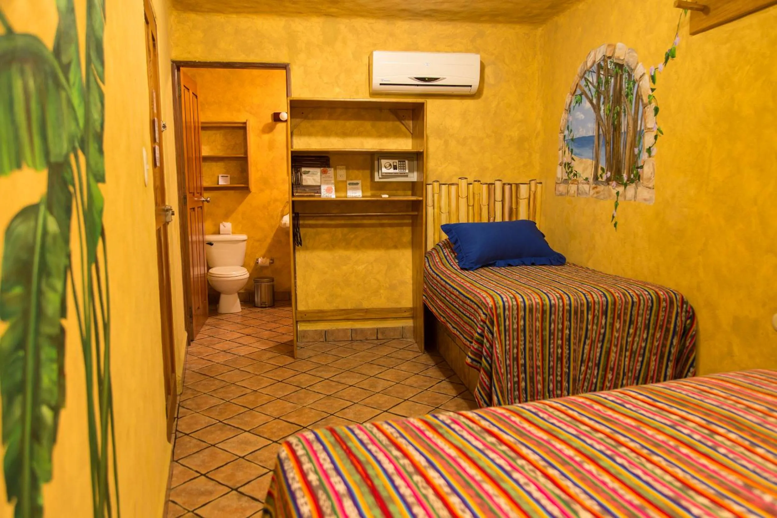 Bed in El Sano Banano Beachside Hotel