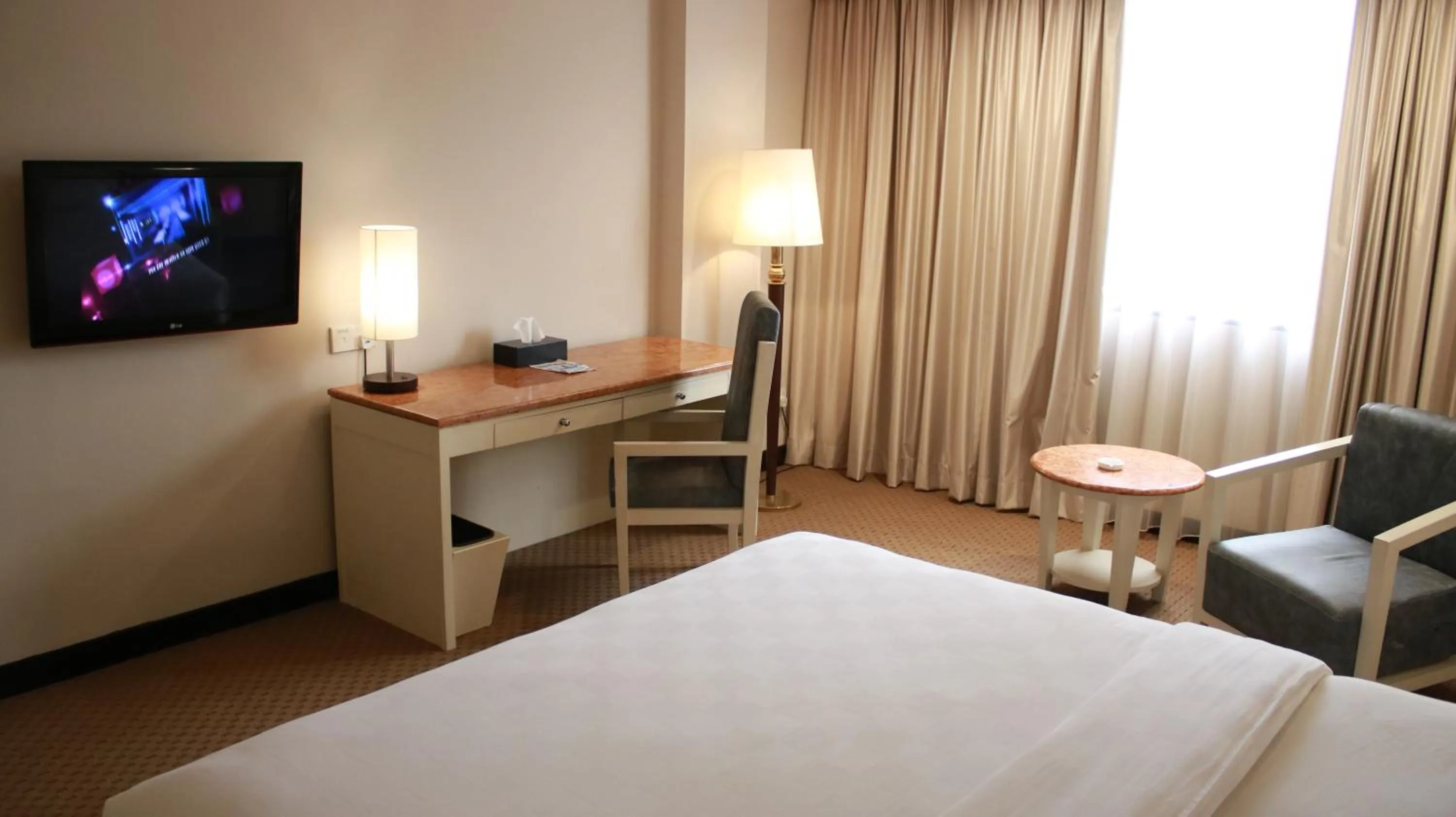 Bed in Beverly Hotel Batam