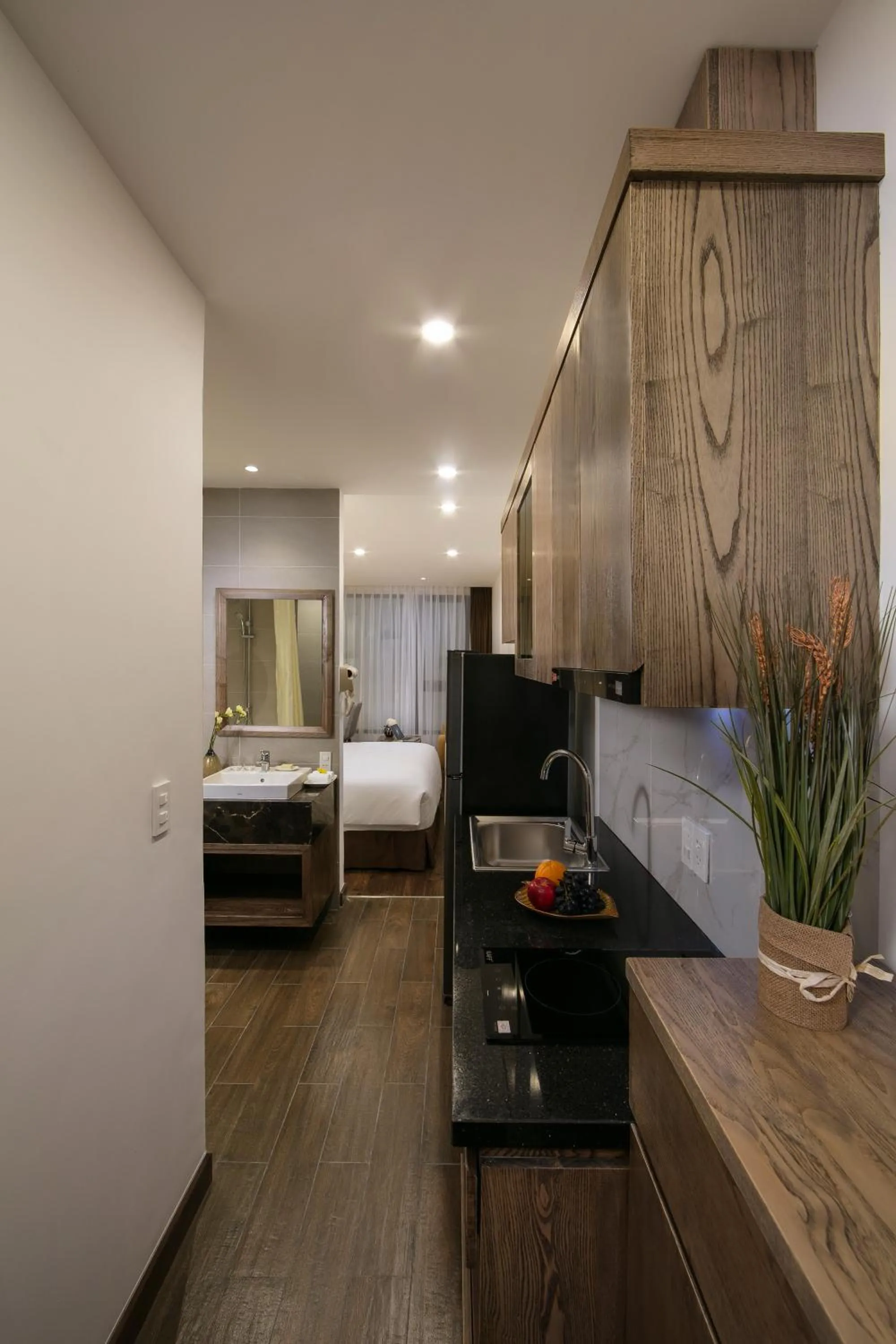 Kitchen or kitchenette, Bed in The Bloom Pham Viet Chanh - Modern Living Space in Saigon - A Top Choice for Western Travelers