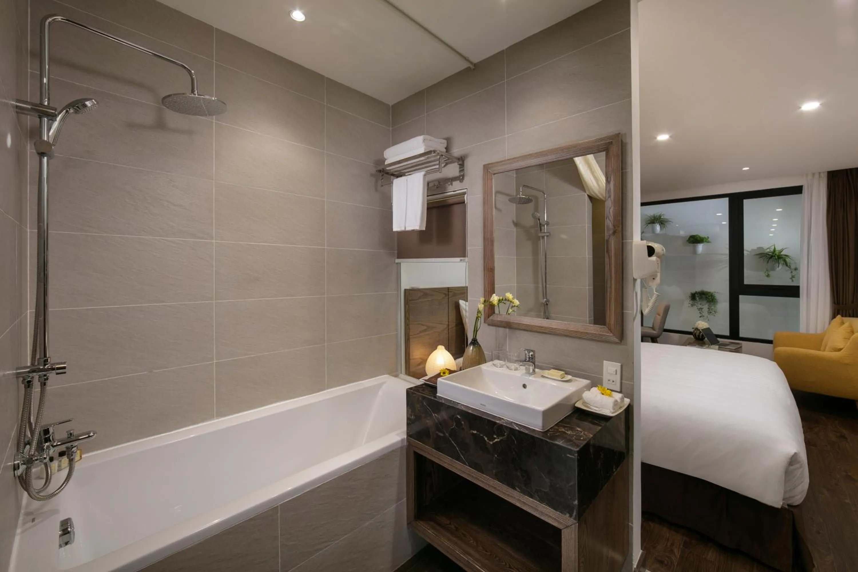 Shower, Bed in The Bloom Pham Viet Chanh - Modern Living Space in Saigon - A Top Choice for Western Travelers