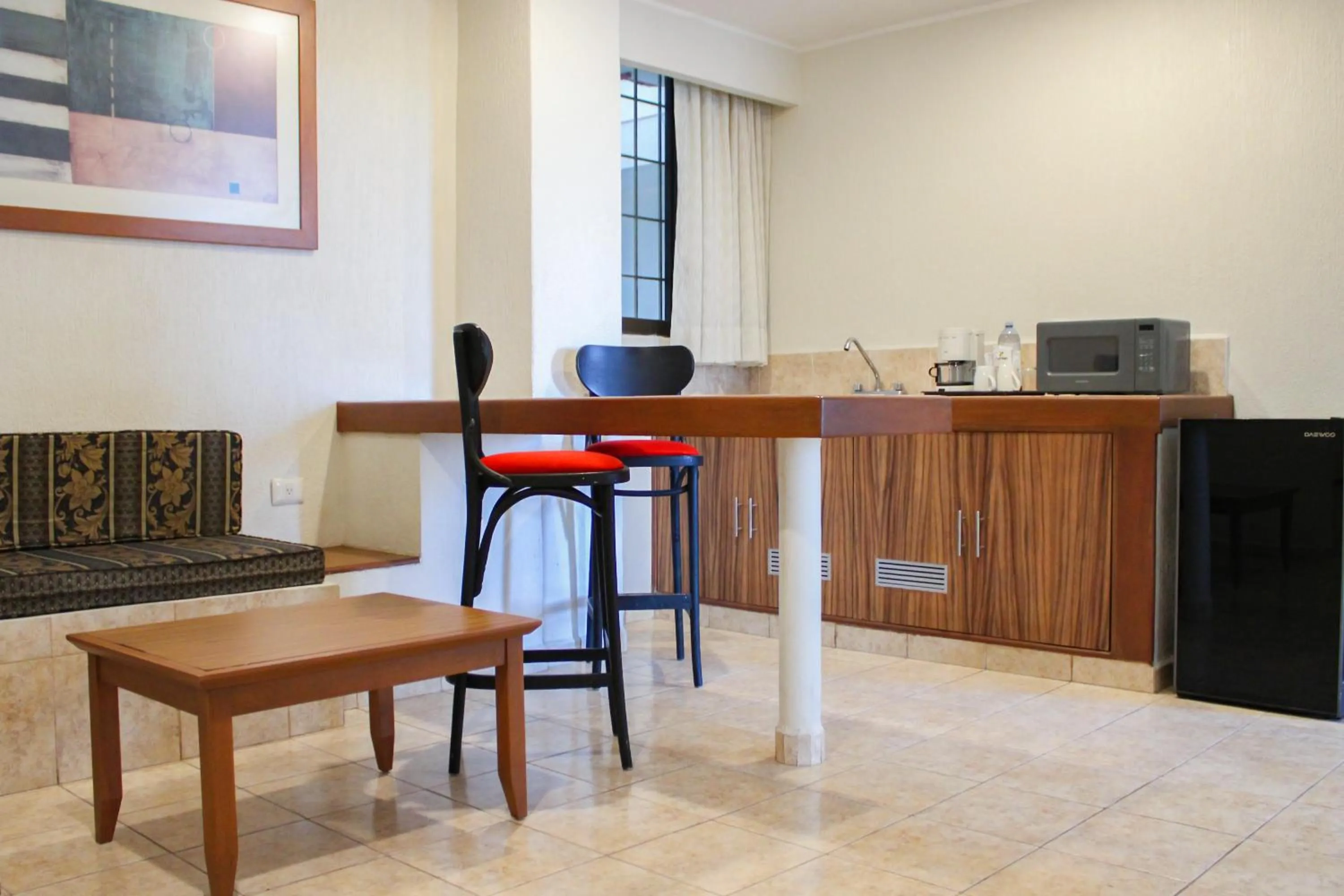 Kitchen or kitchenette in Hotel & Suites Real del Lago