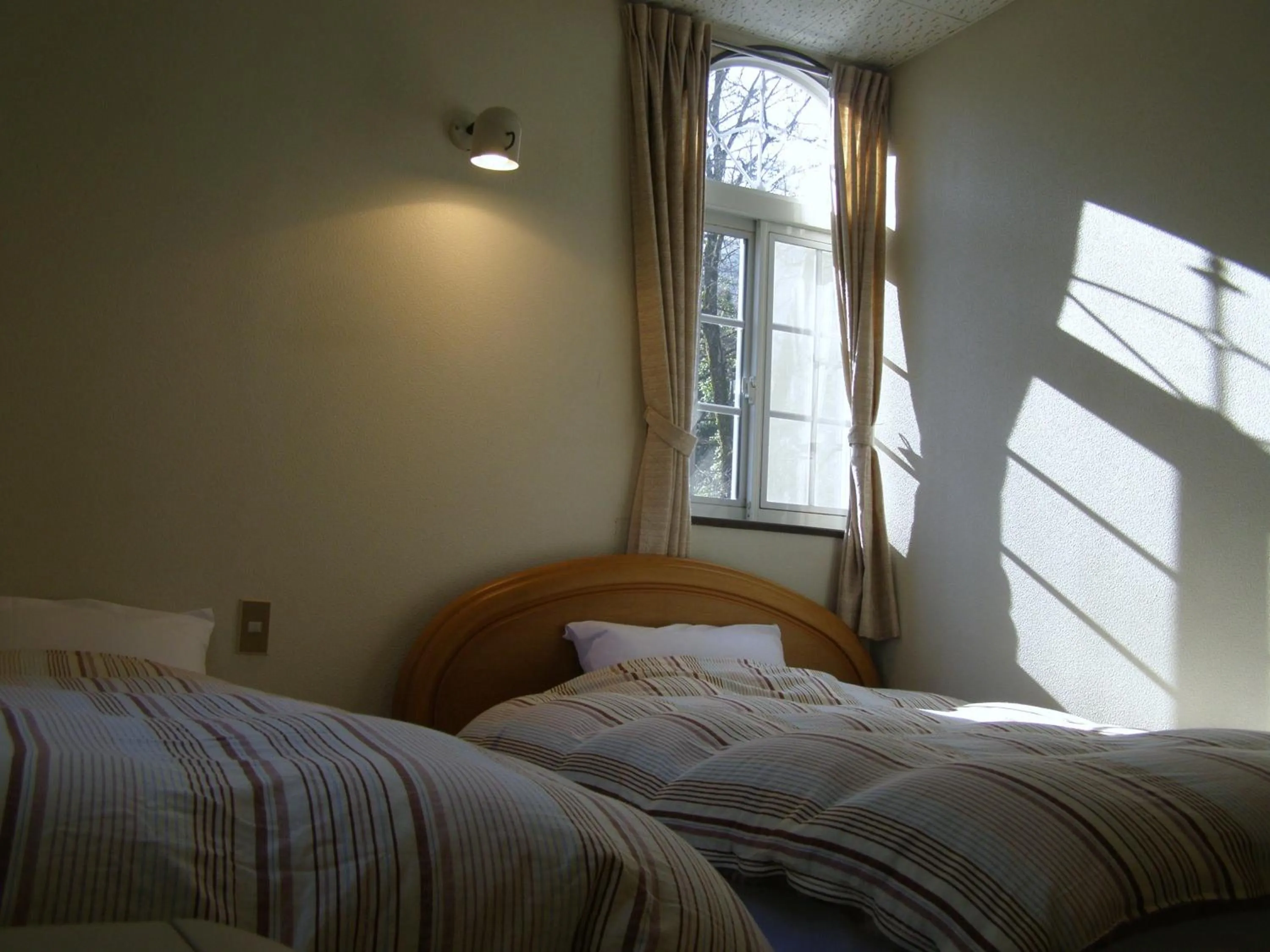 Bed in Sunny Side Hut