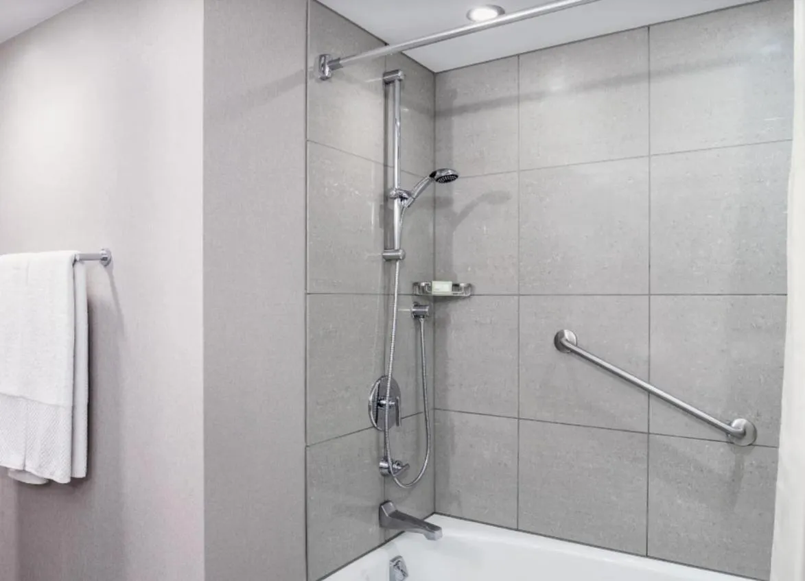 Shower in The Marquette Hotel, Curio Collection by Hilton