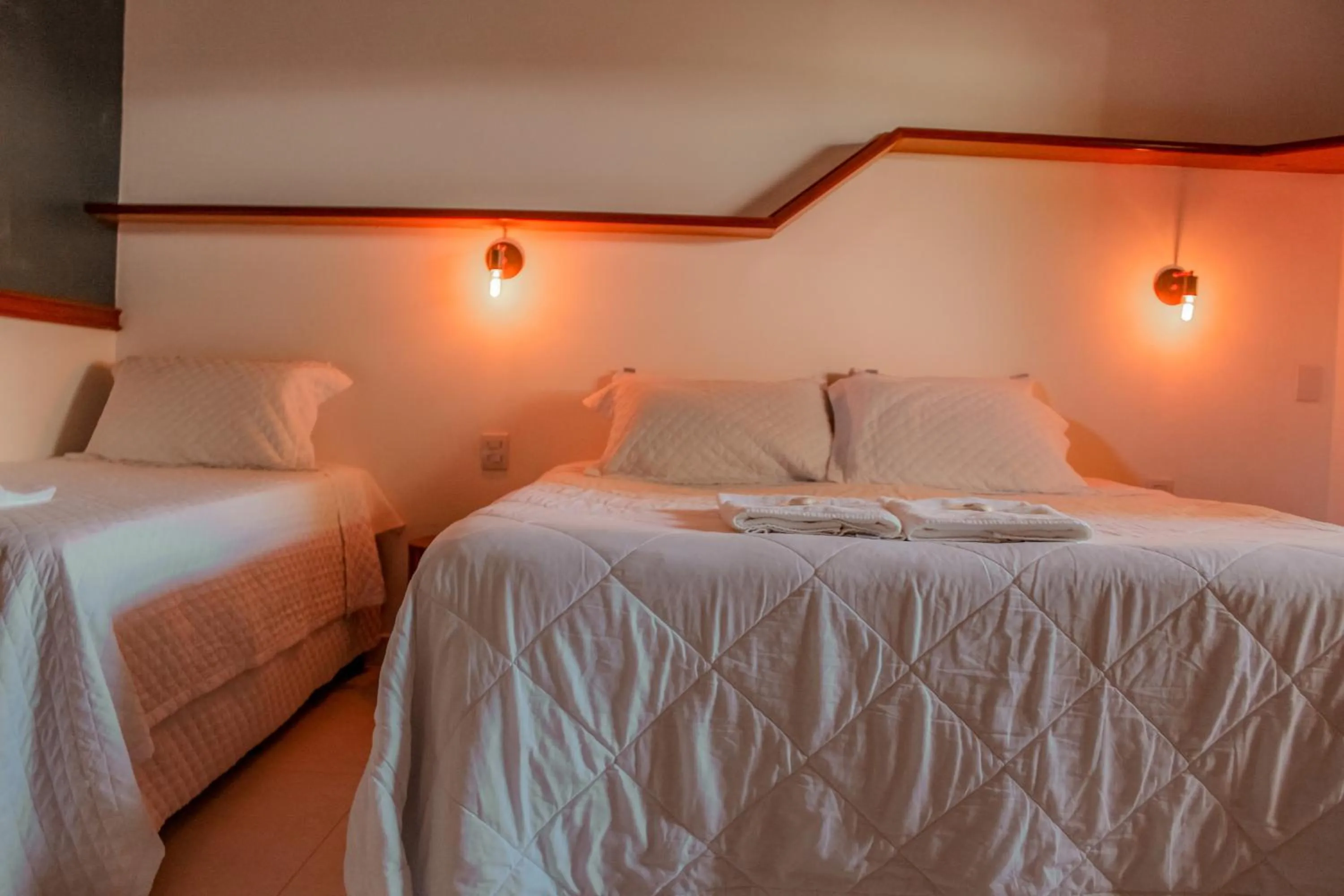 Bed in Pousada Quintal da Lua