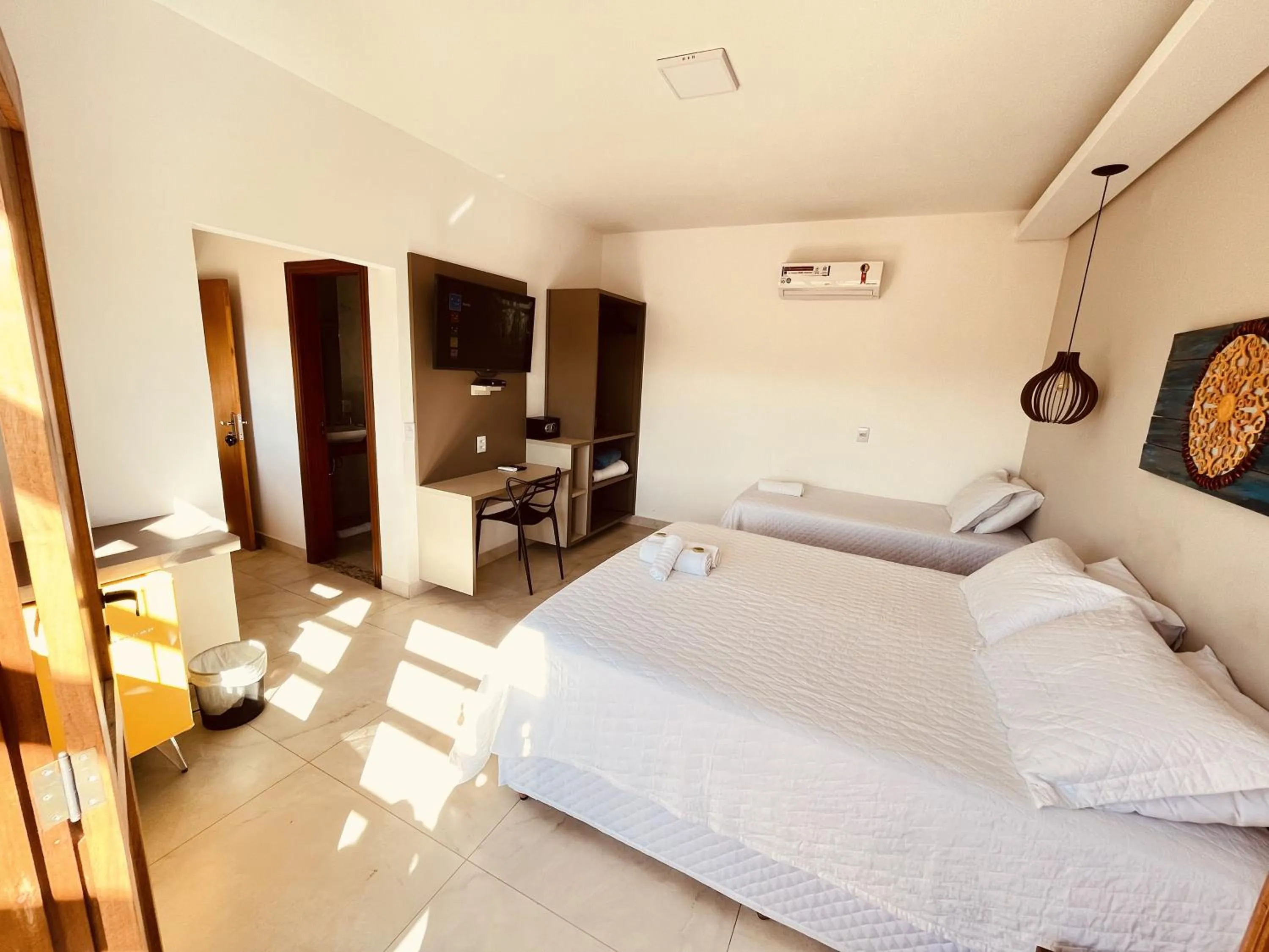 Bed in Pousada Quintal da Lua