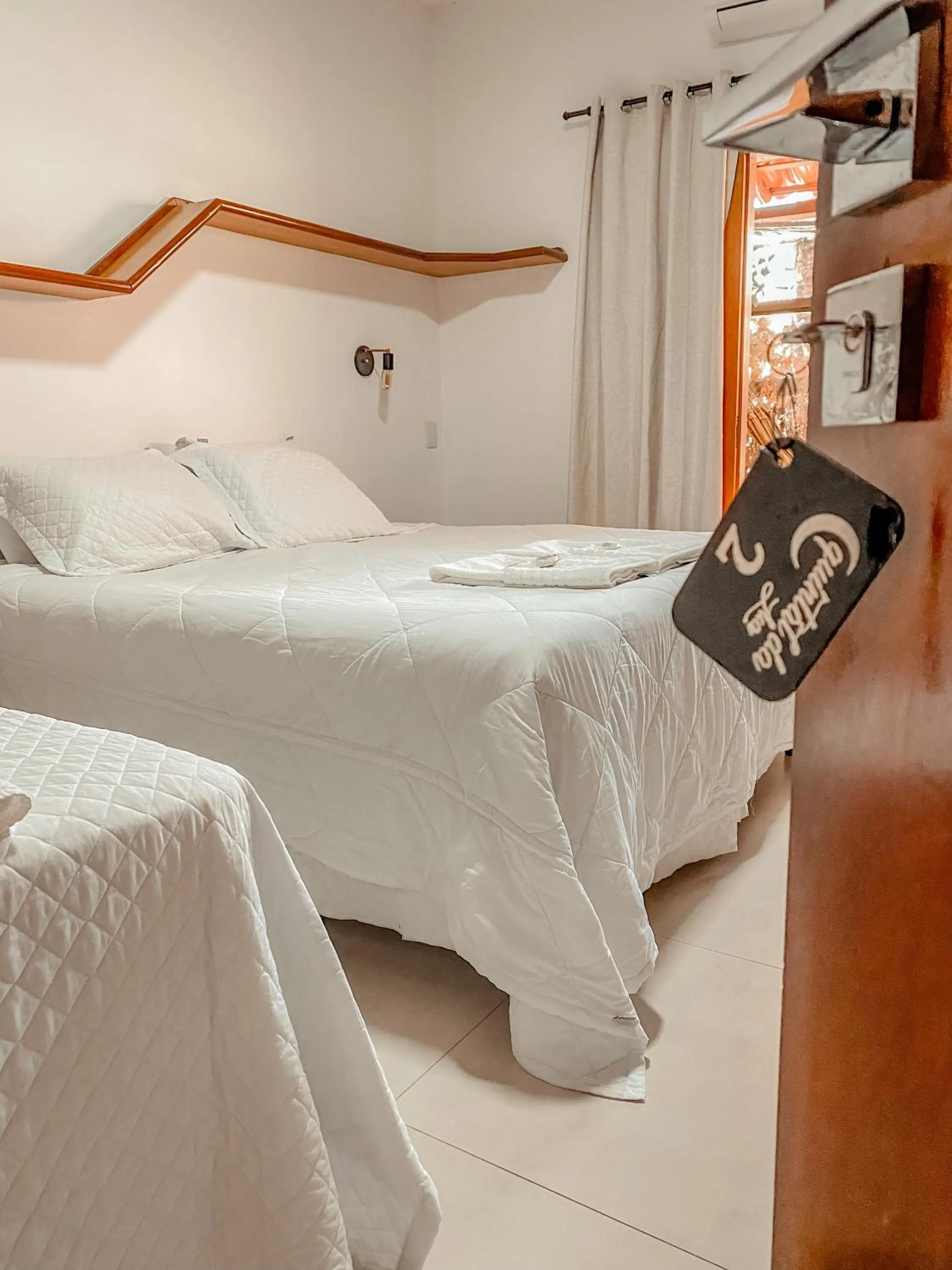 Photo of the whole room, Bed in Pousada Quintal da Lua