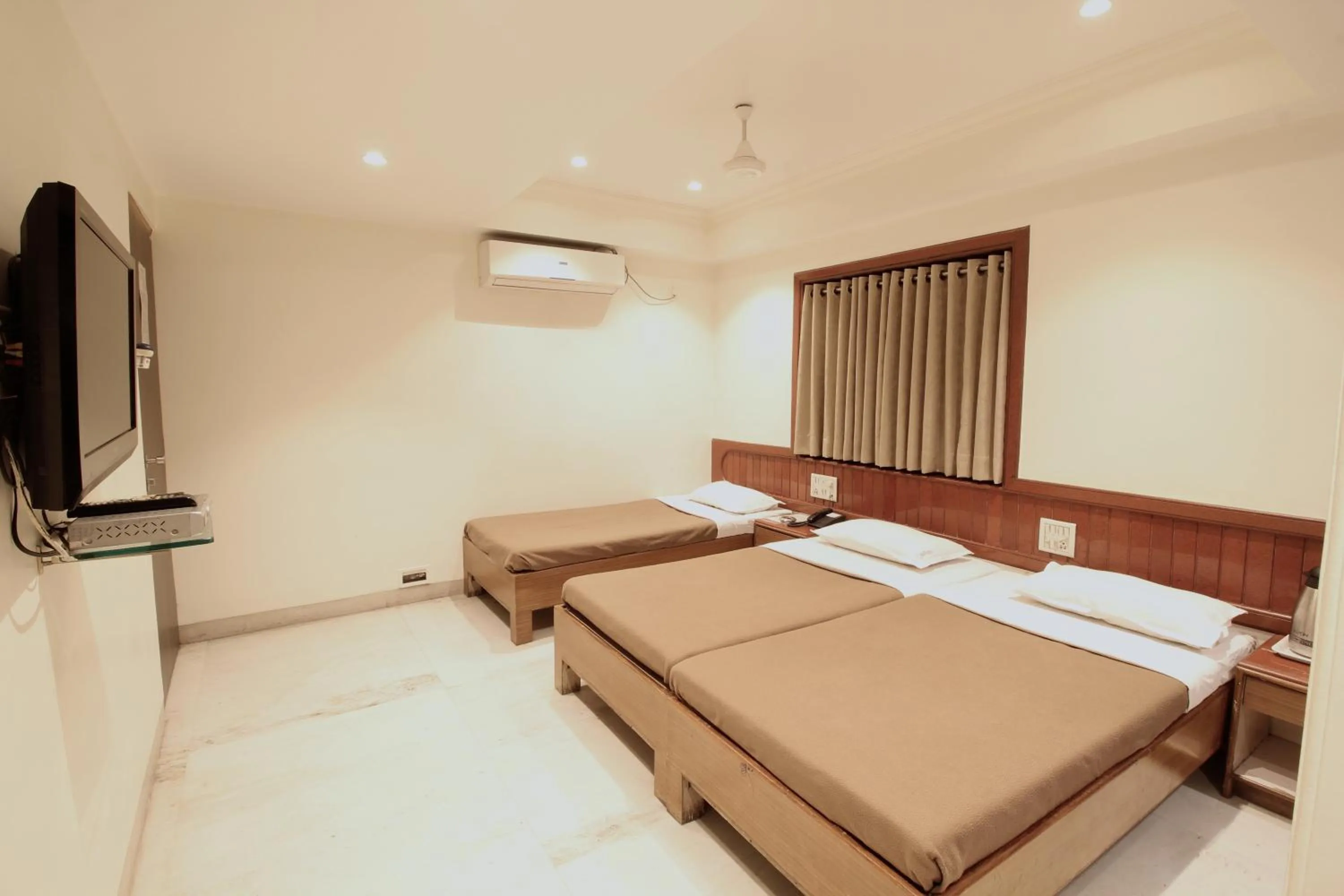 Photo of the whole room, Bed in Hotel Shivkrupa