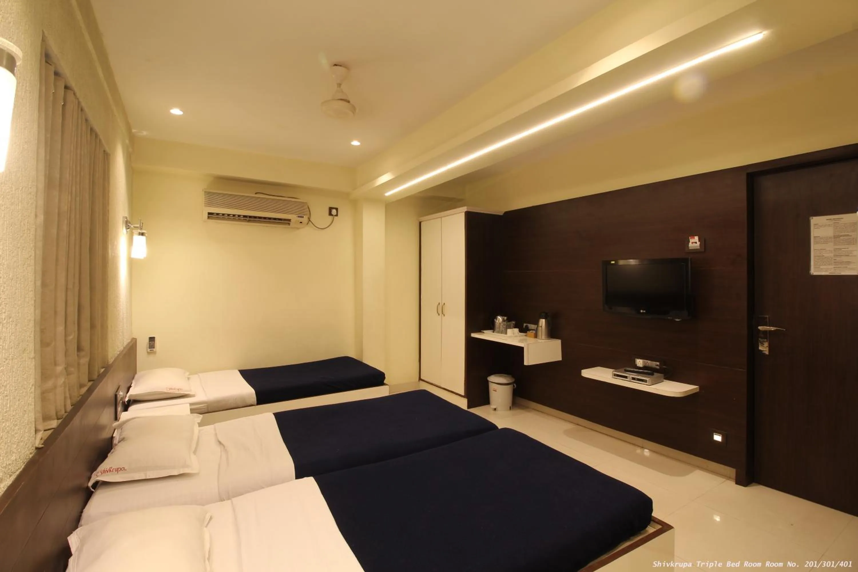 Photo of the whole room, Bed in Hotel Shivkrupa