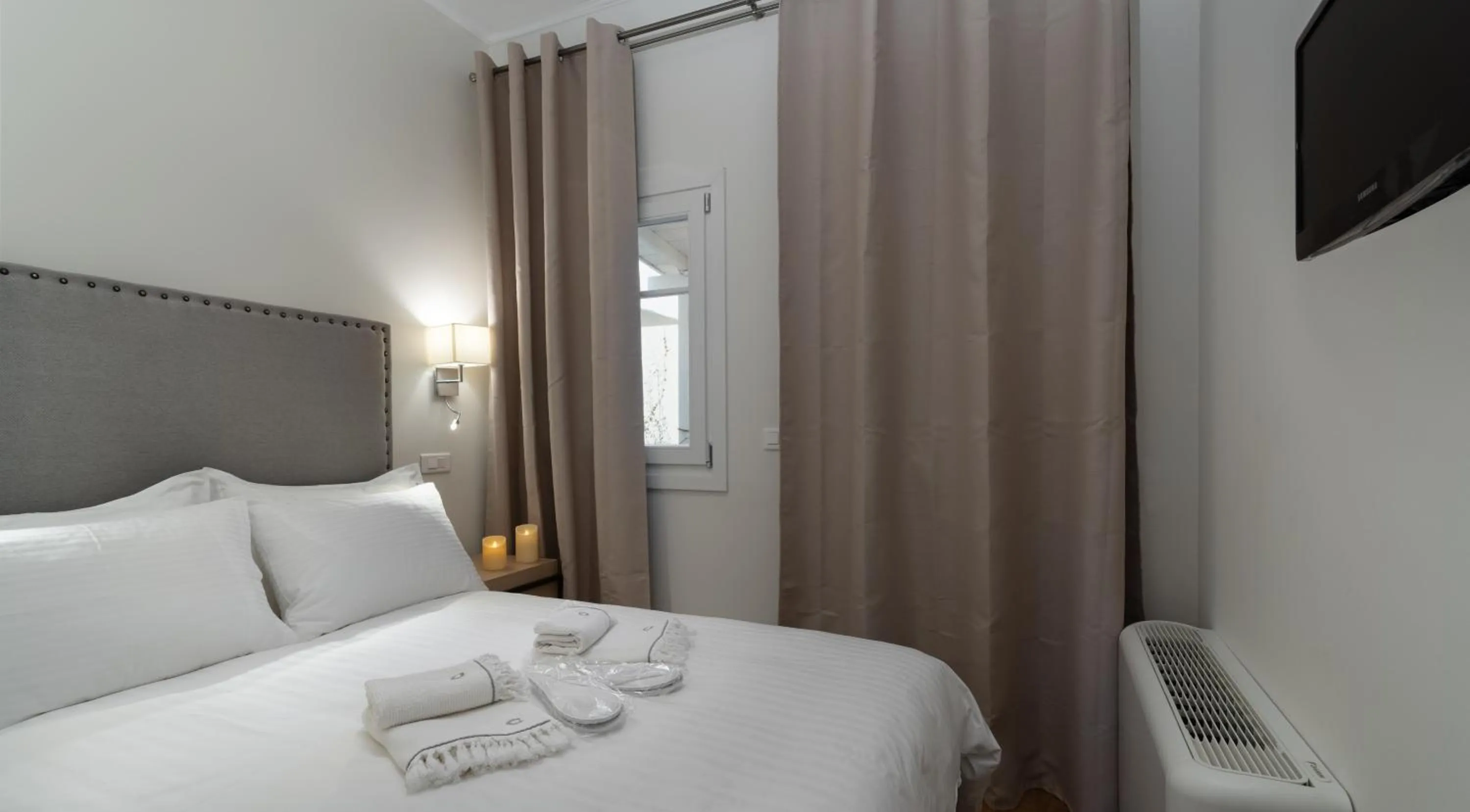 Bed in Porto Vecchio Luxury Suites
