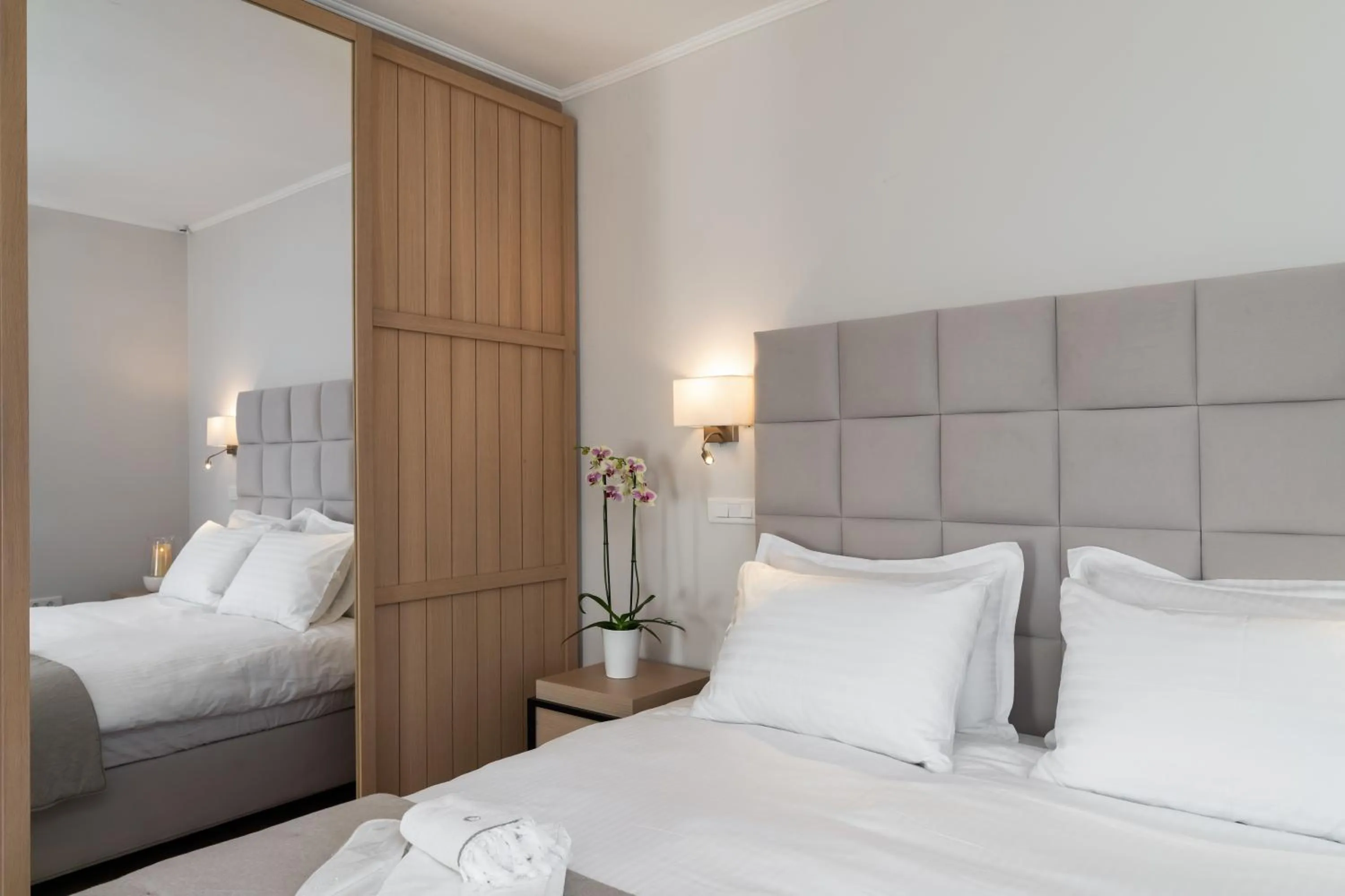 Bed in Porto Vecchio Luxury Suites