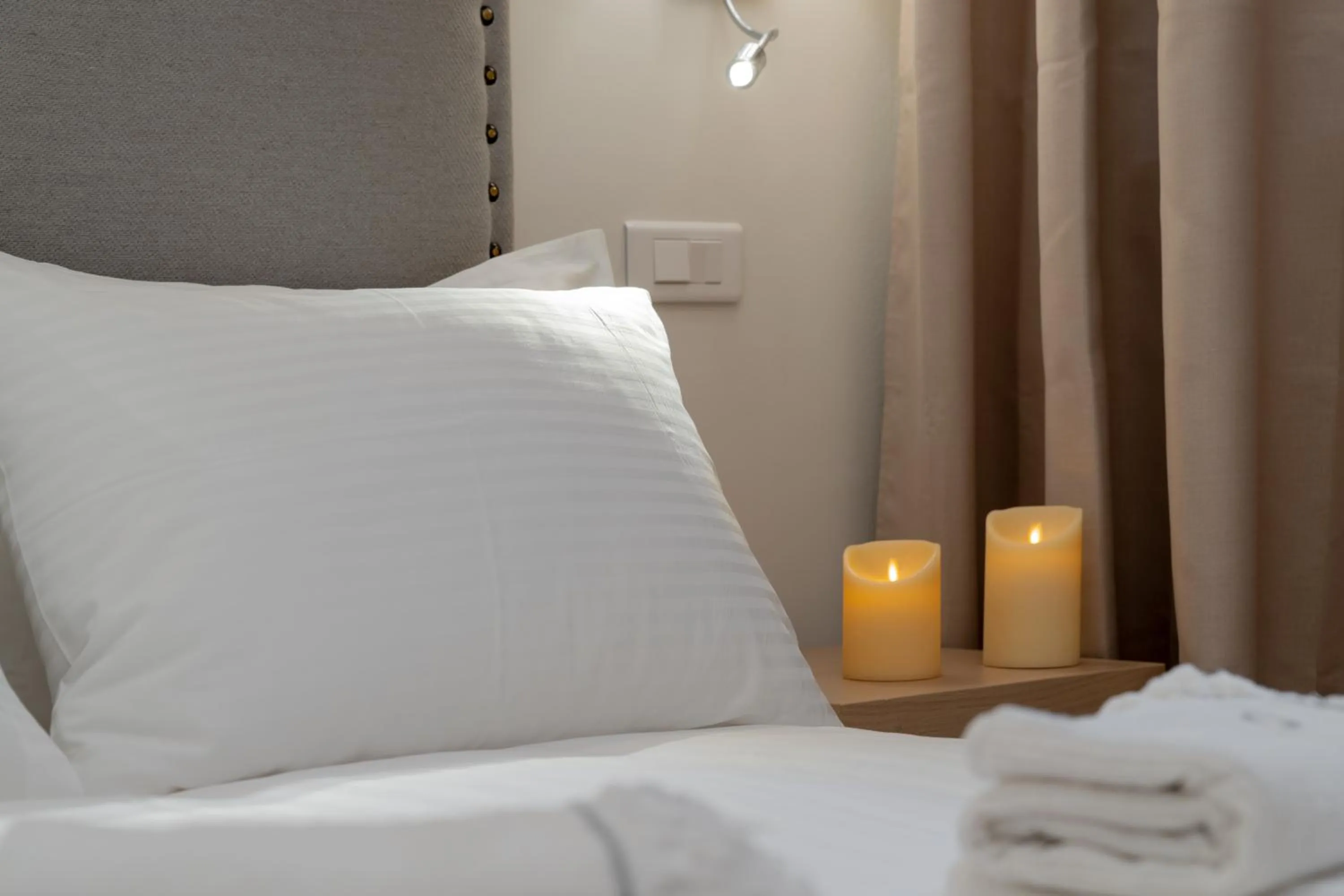 Bed in Porto Vecchio Luxury Suites