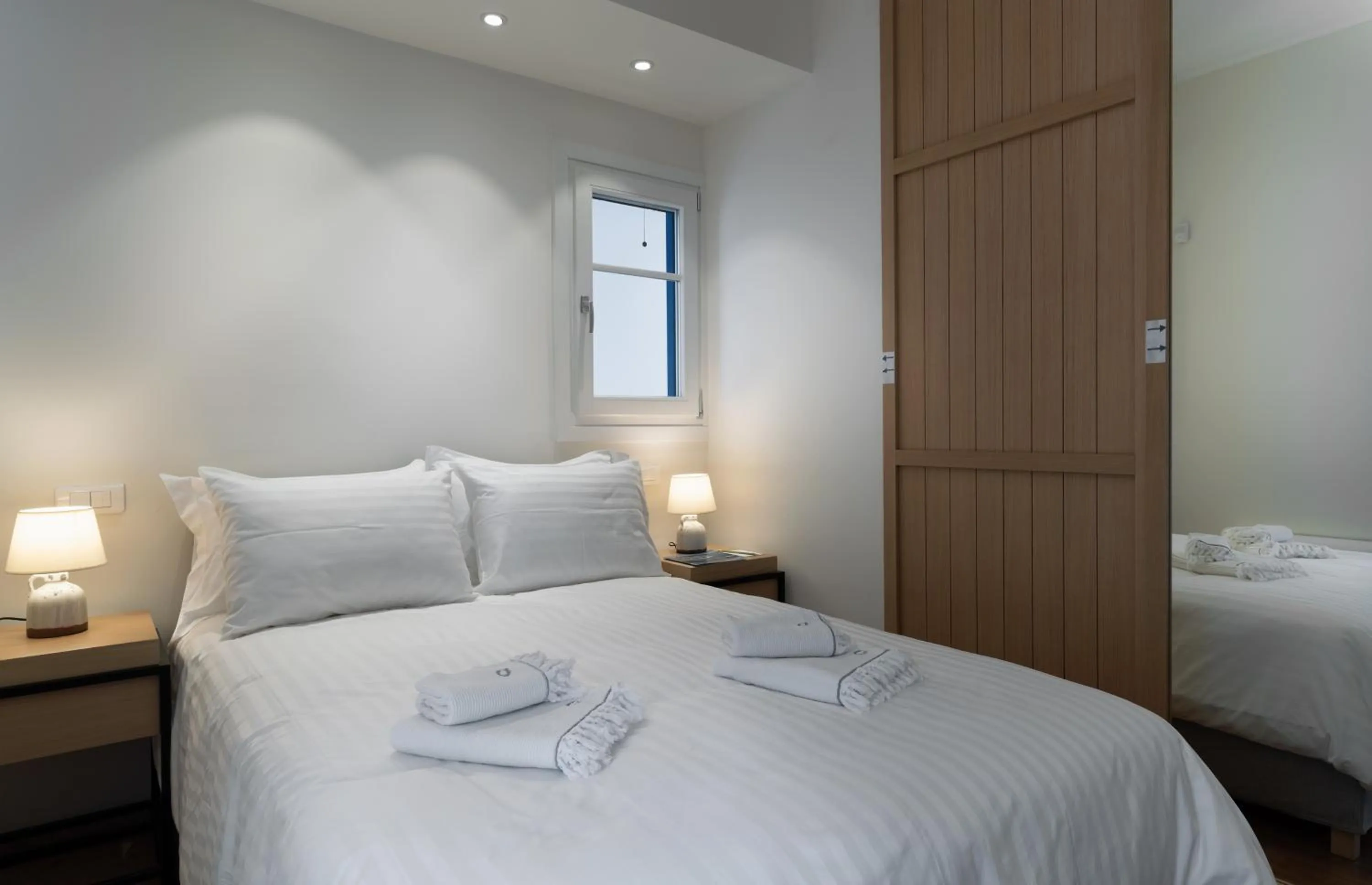 Bed in Porto Vecchio Luxury Suites