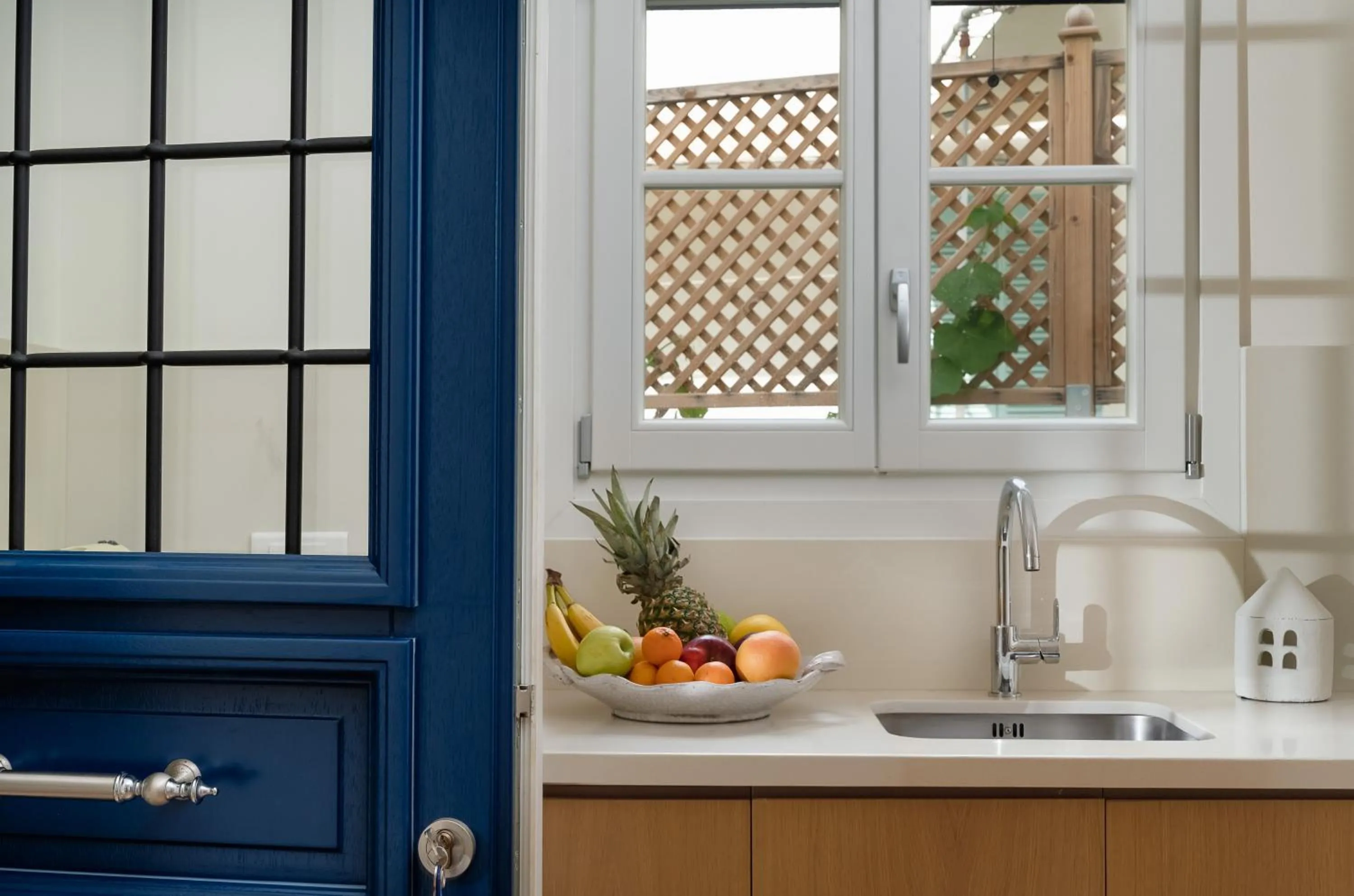 Kitchen or kitchenette in Porto Vecchio Luxury Suites