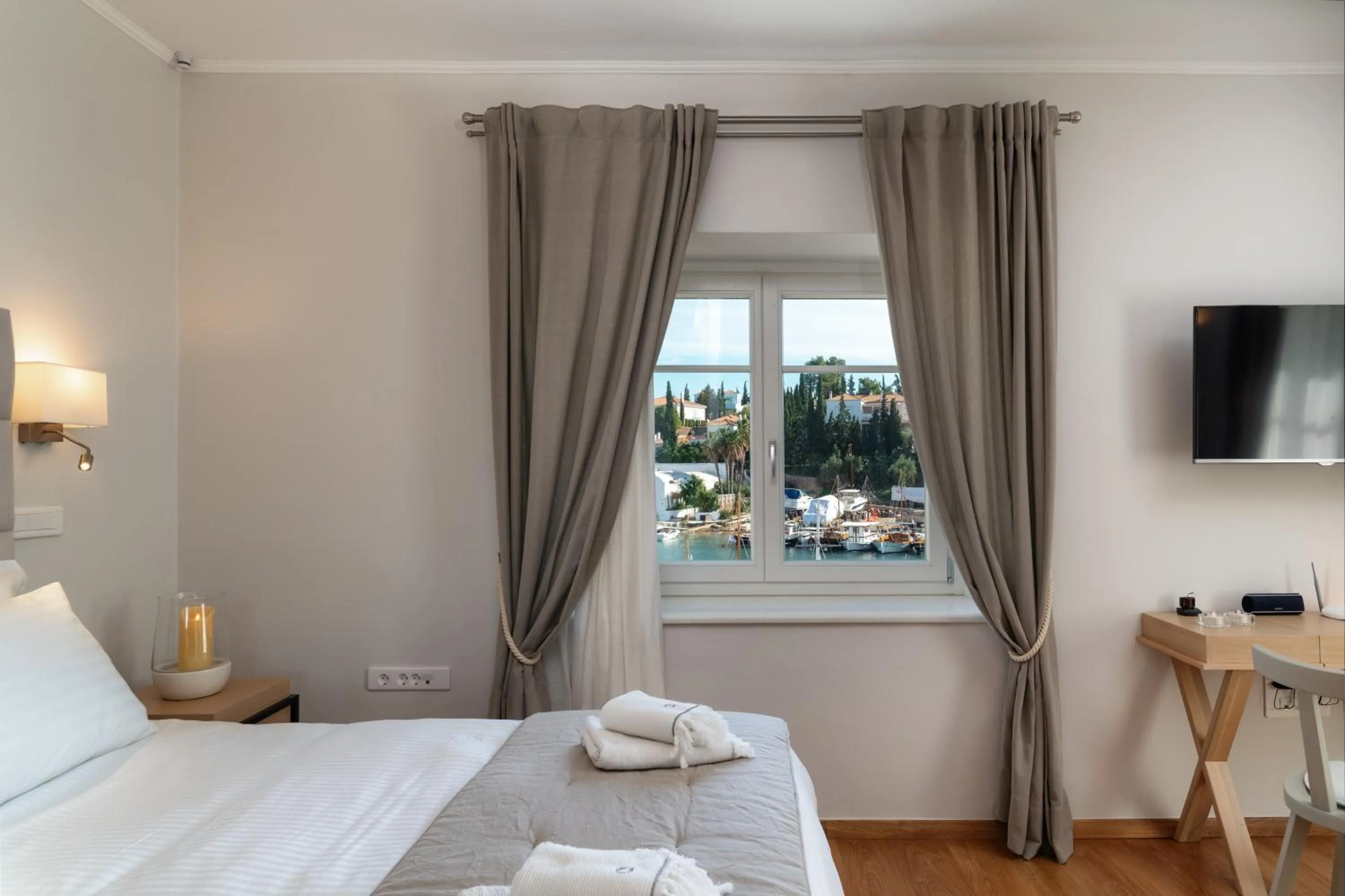 Bed in Porto Vecchio Luxury Suites