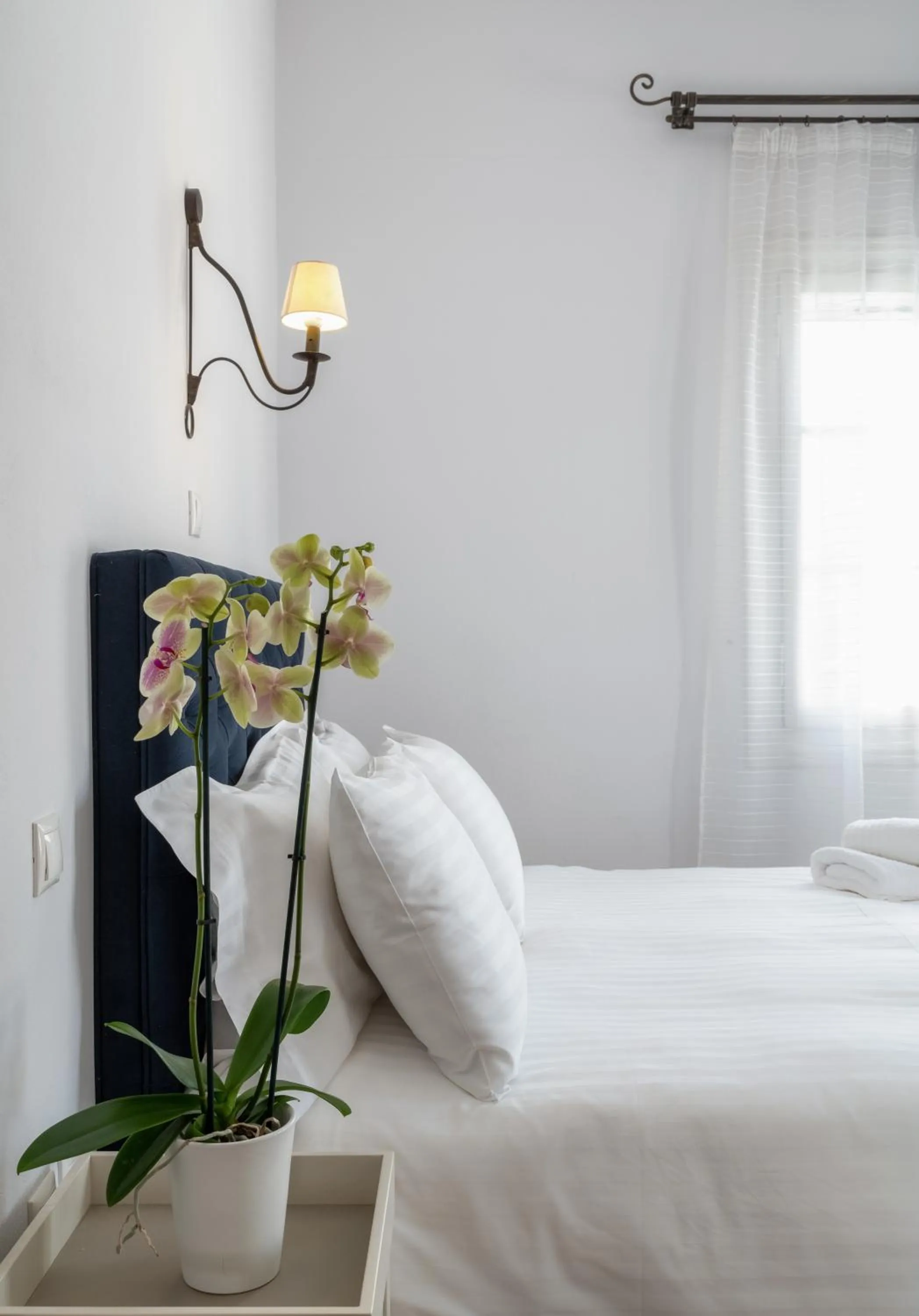 Bed in Porto Vecchio Luxury Suites