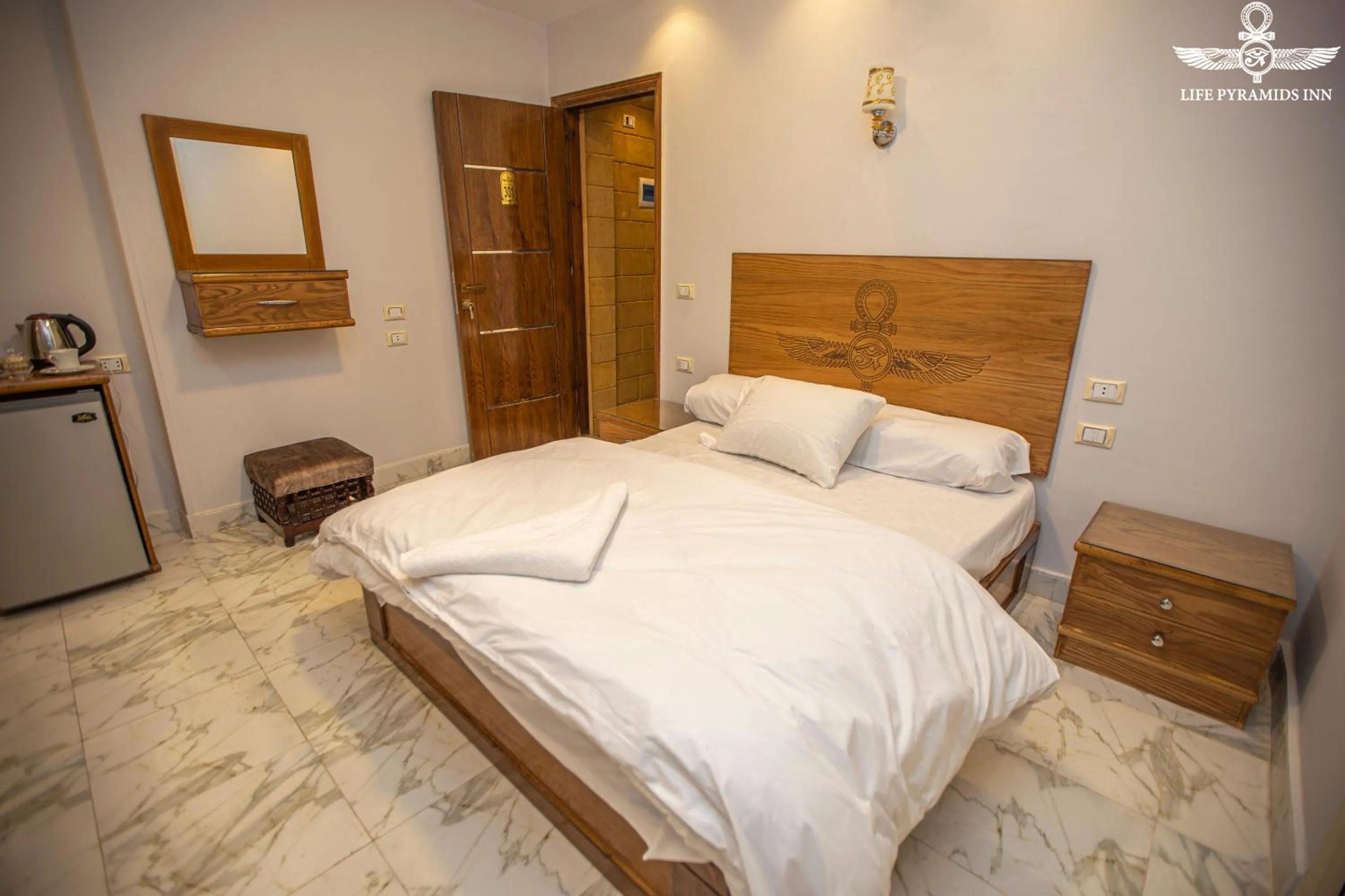 Bed in Life Pyramids Inn