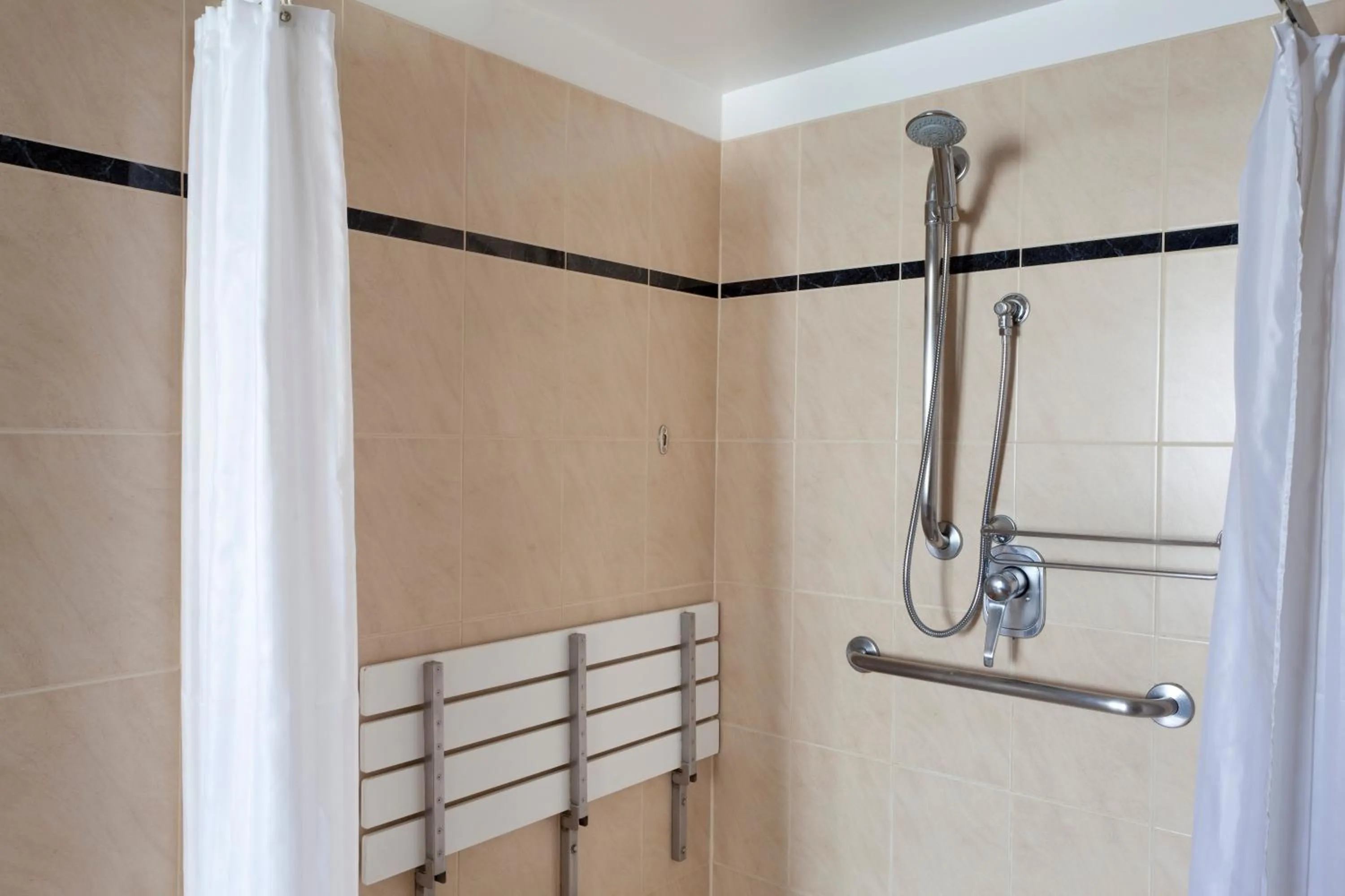 Bathroom in Quest Savoy