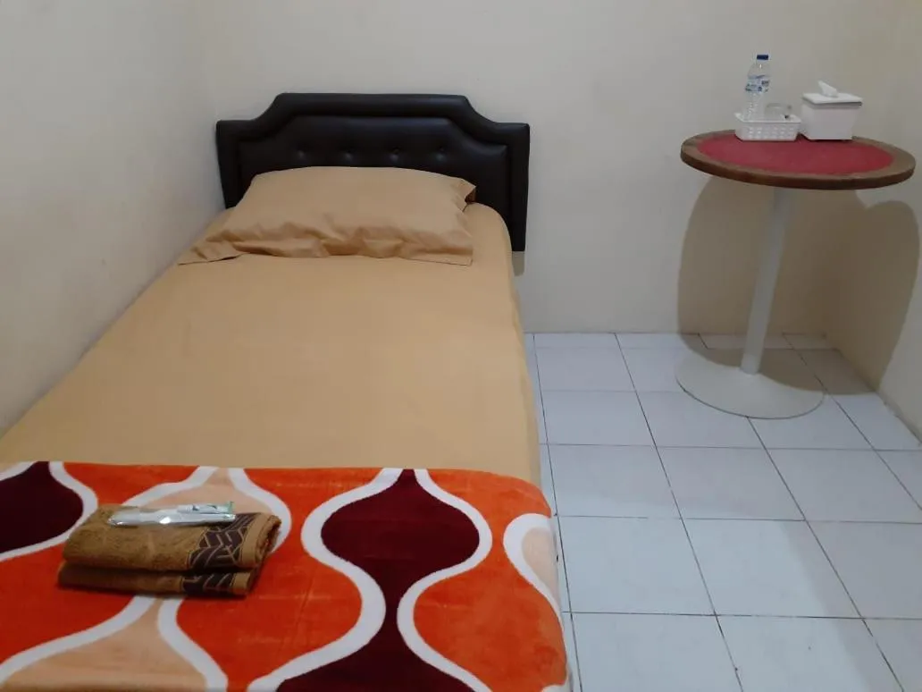 Bedroom, Bed in Kost Carmelia Syariah Baranangsiang Bogor