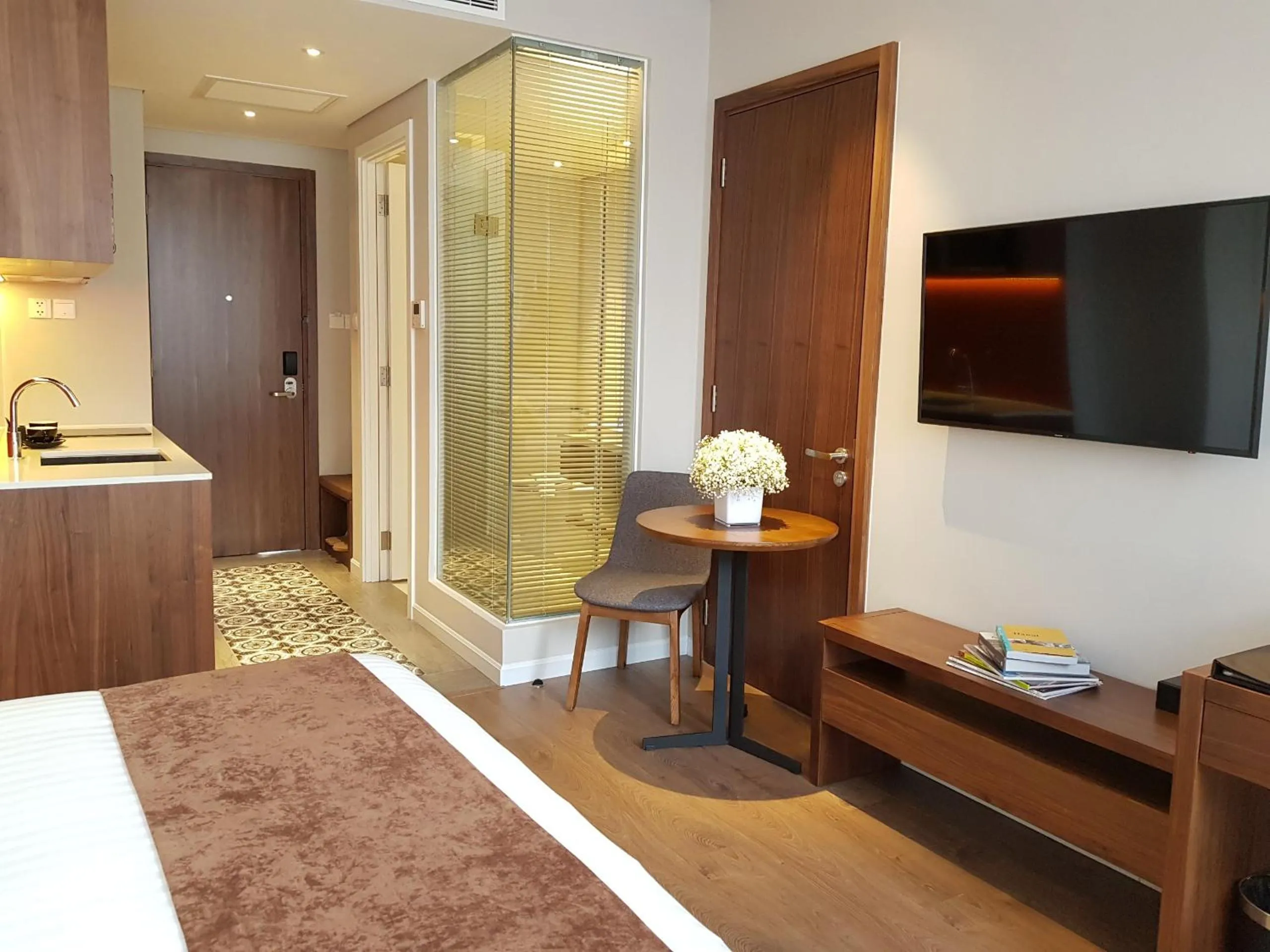 Bed in Orchid Boutique Hotel & Apartment