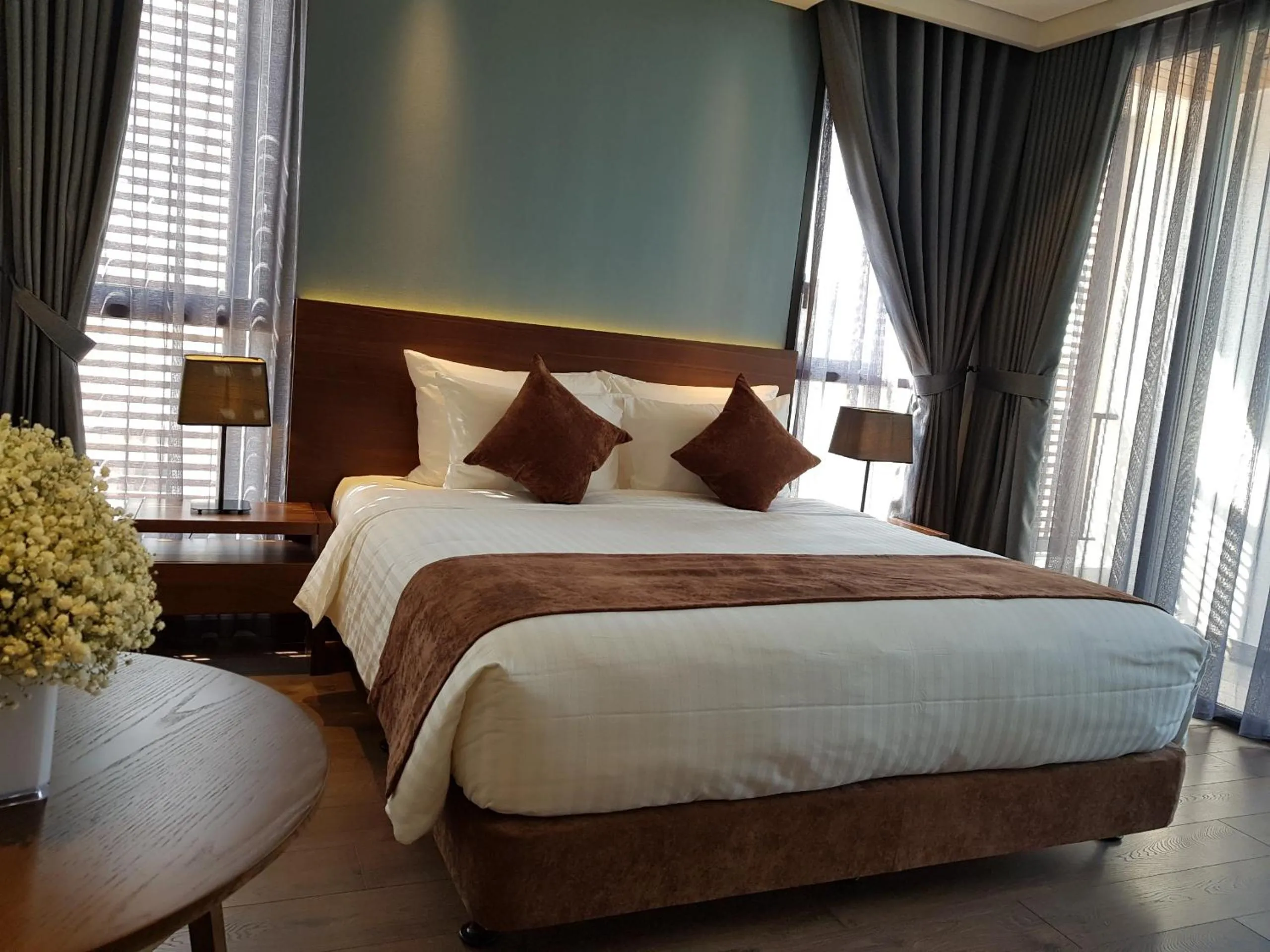 Bed in Orchid Boutique Hotel & Apartment